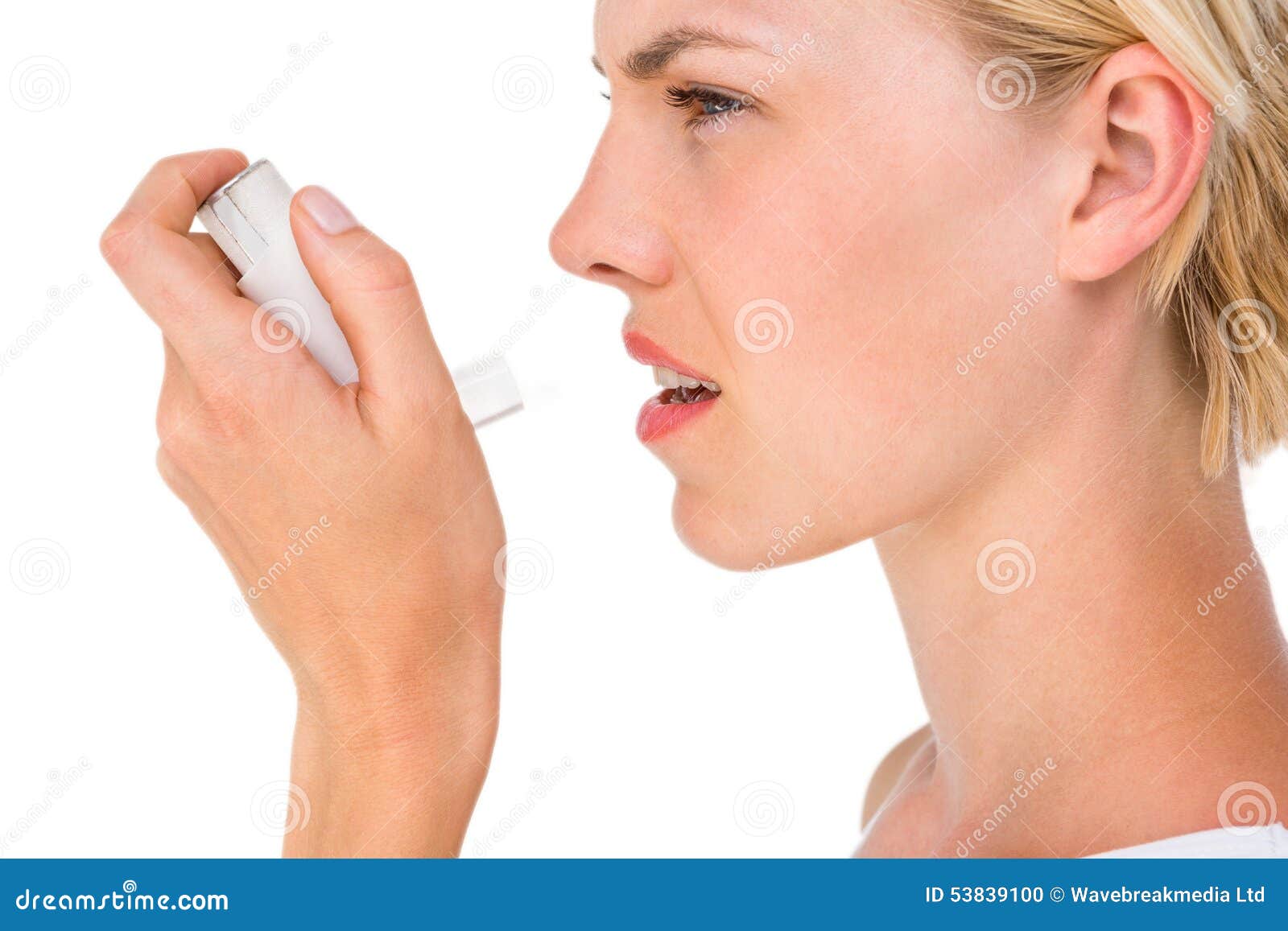 asthmatic pretty blonde woman using inhaler