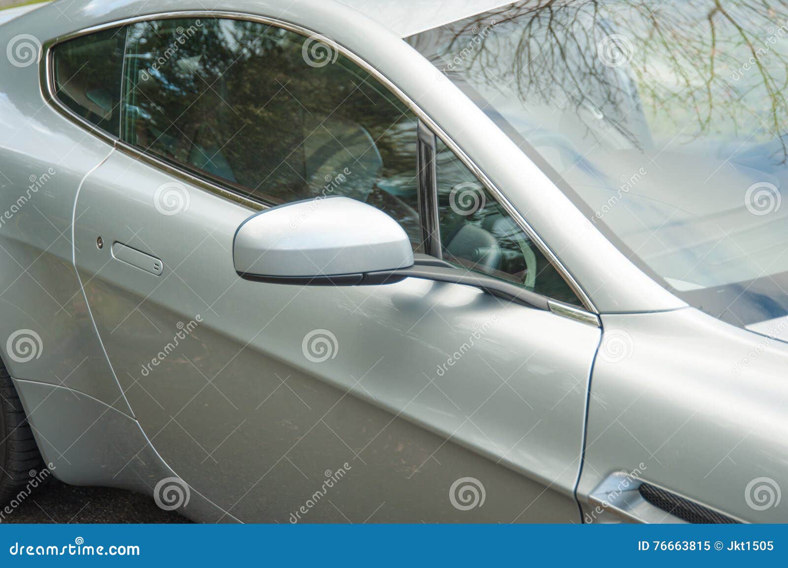 an aston martin vantage english grand tourer right window