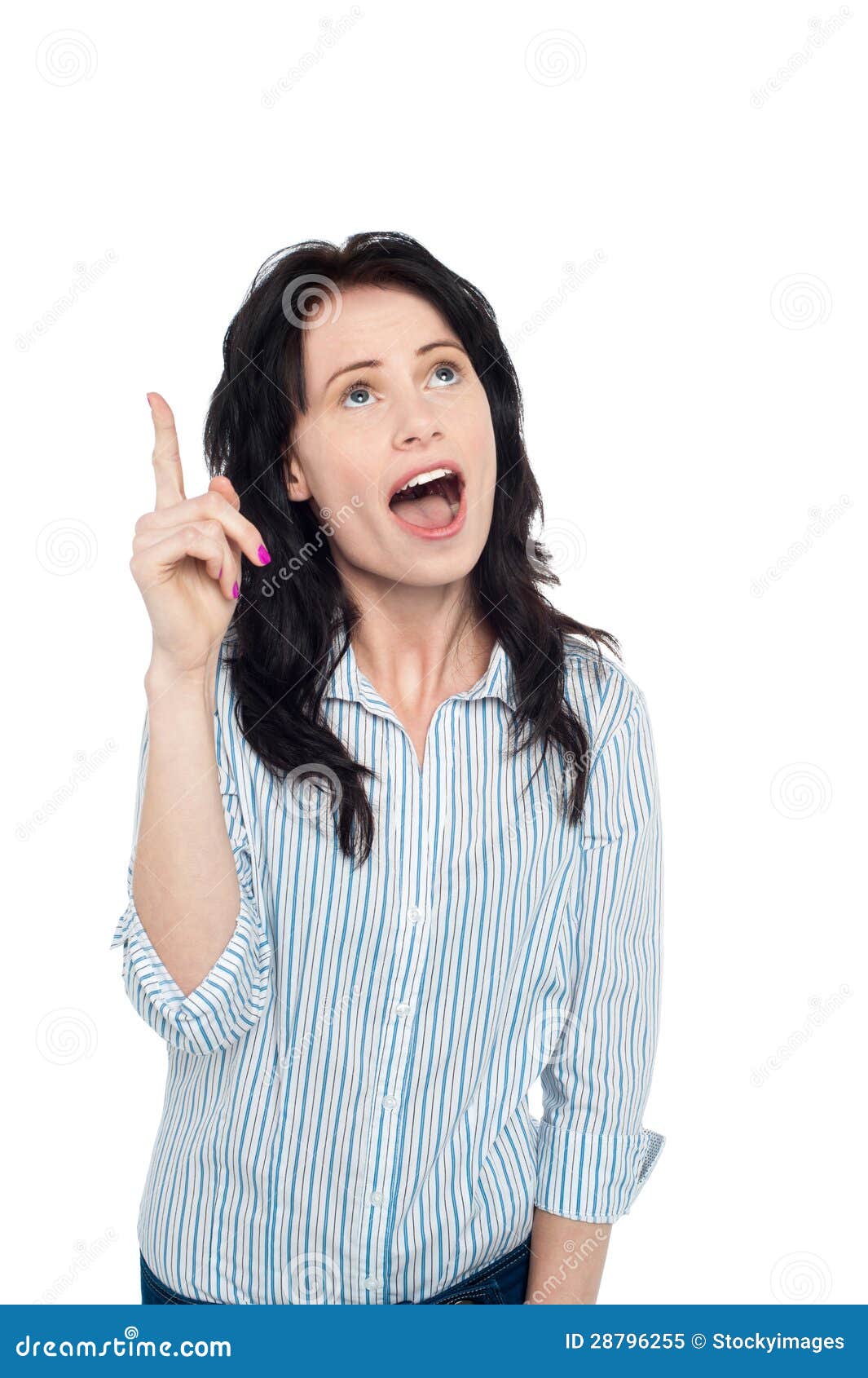 Astonished woman looking and pointing upwards. Astonished young woman pointing her index finger upwards, mouth wide open.