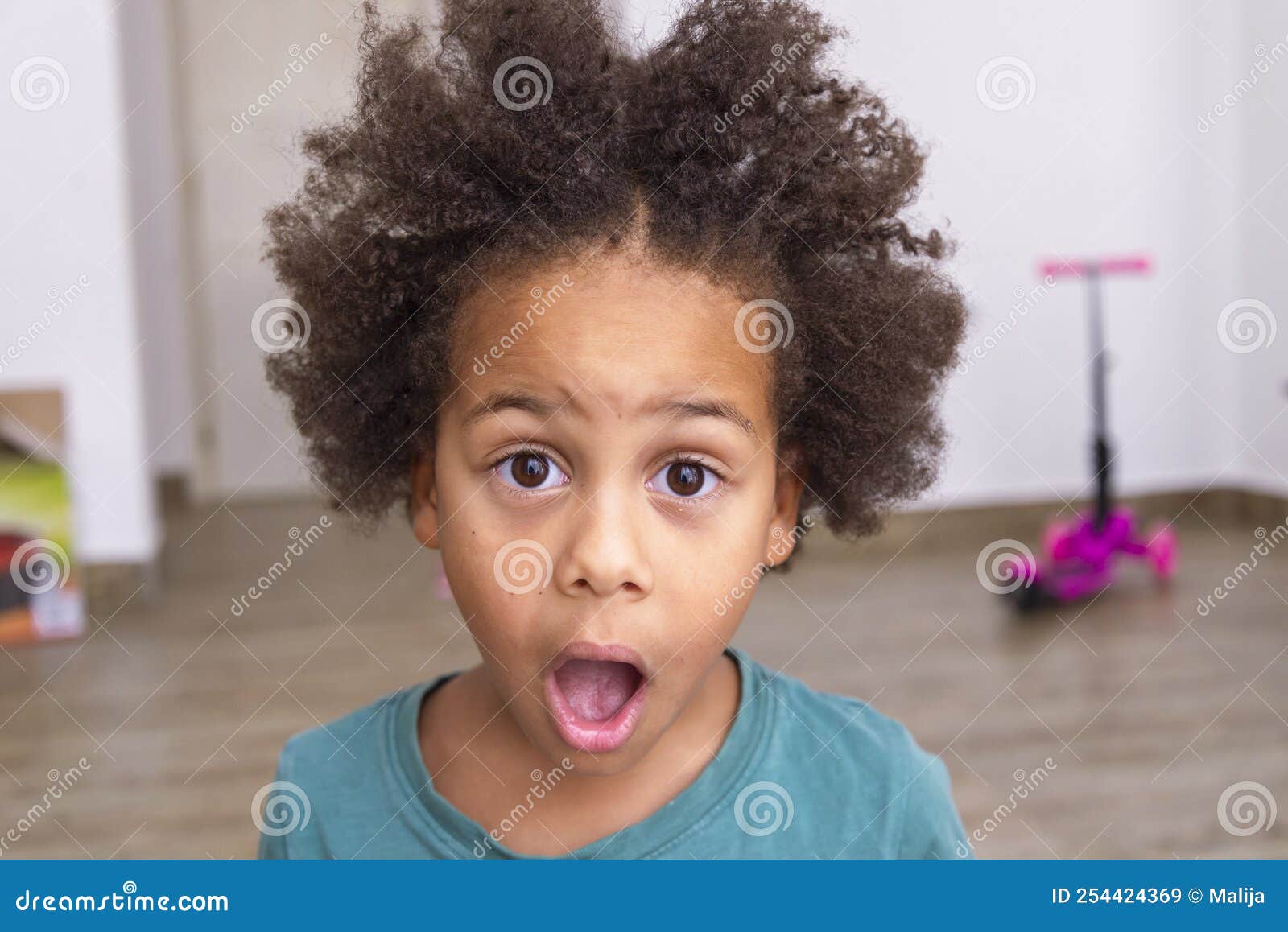 astonishment, shock, surprise, excitement and fascination on little  boy`s face.