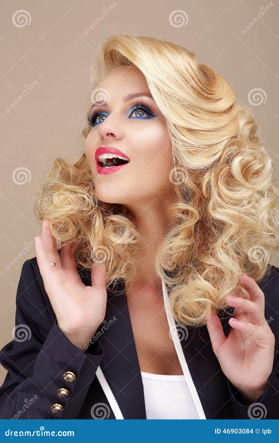 astonishment. surprised blond woman looking up