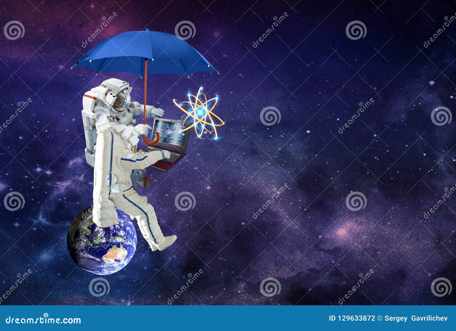Astronaut Sitting on a Planet with Laptop Under Umbrella Spaceman Stock