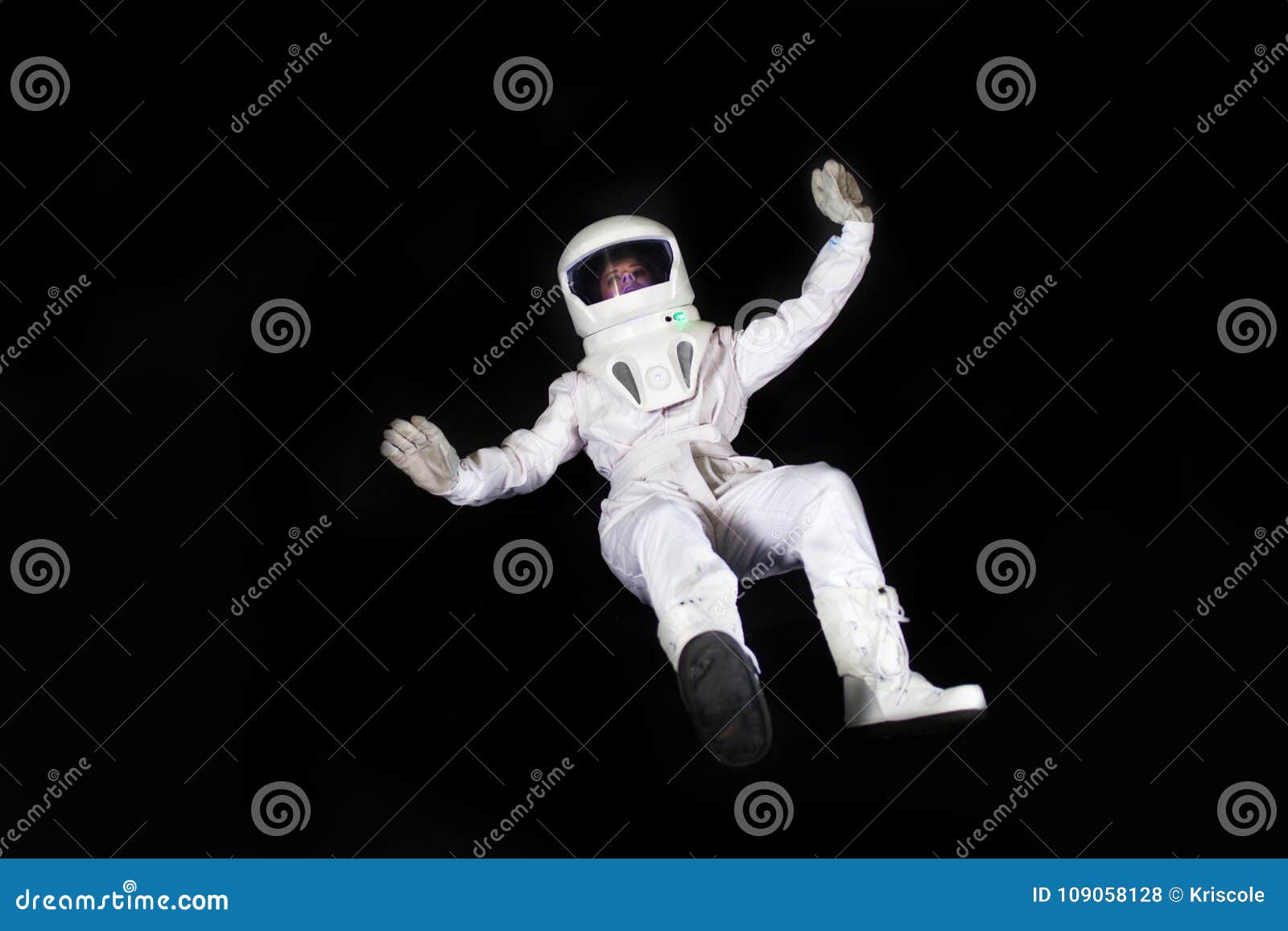 Astronaut in Space, in Zero Gravity on Black Background. Man in Space