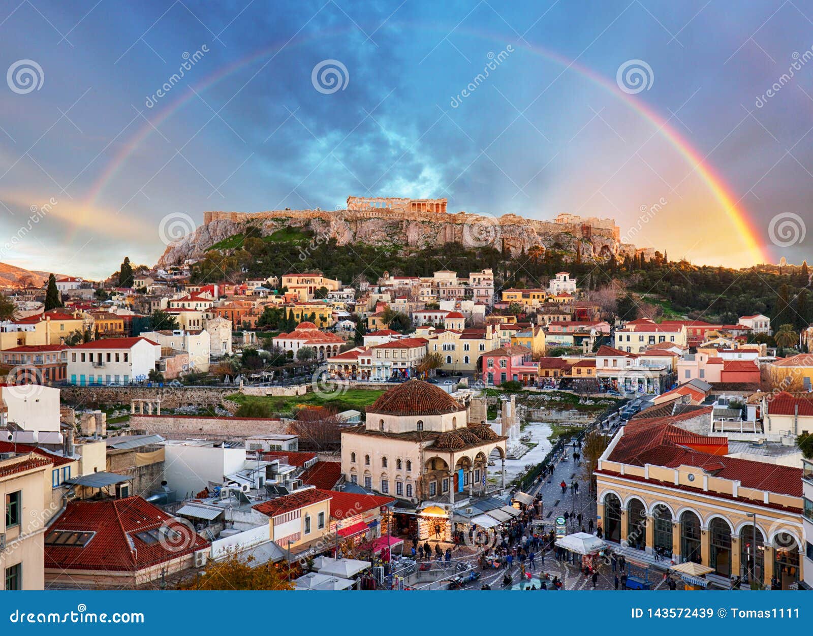 athens, greece -  monastiraki square and ancient acropolis with rainbow