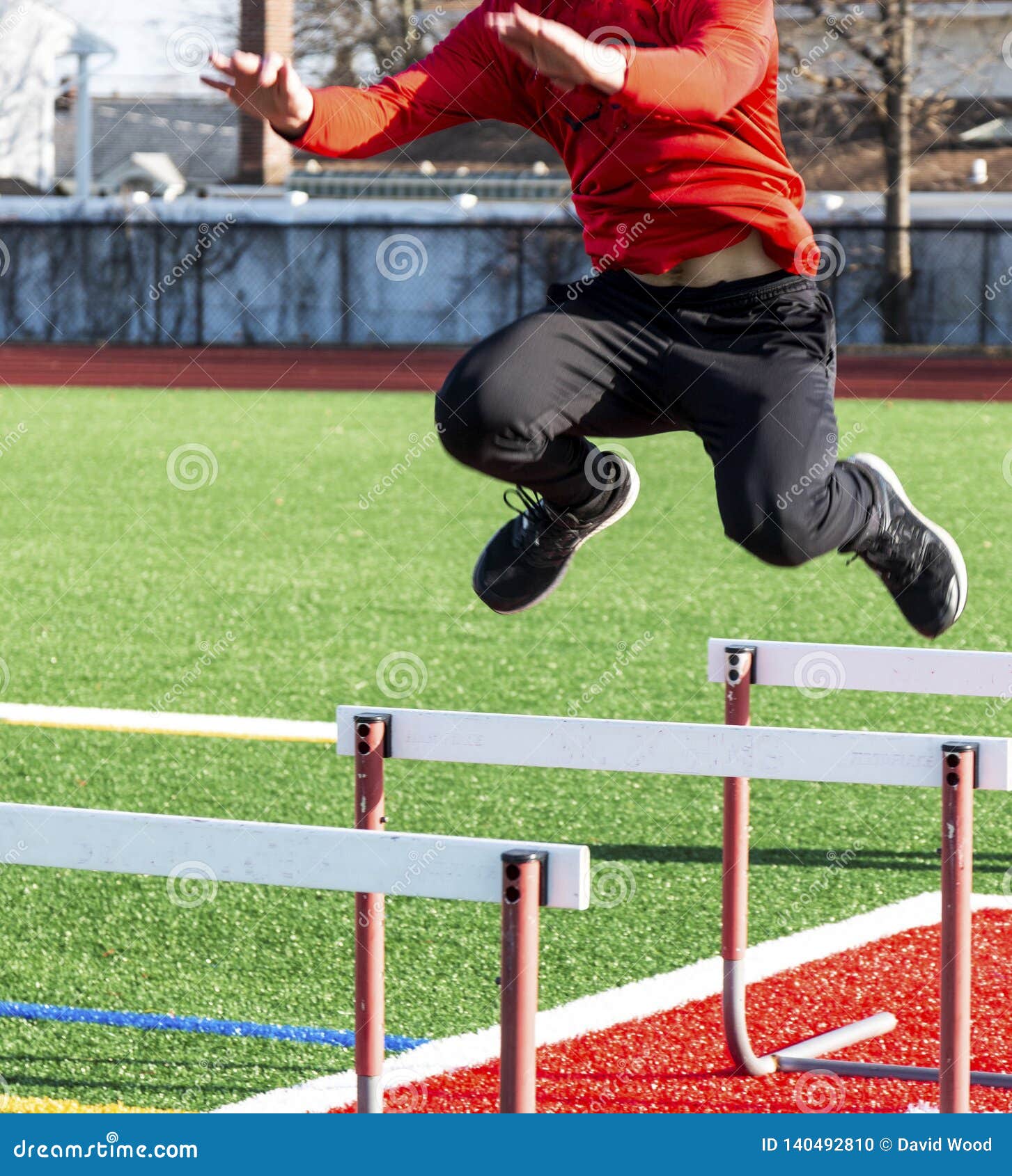 Athlete In Air Jumping Over Hurdles Stock Photo Image Of Long Objects Athlete In Air Jumping Over Hurdles Stock Photo Image Of Long Objects