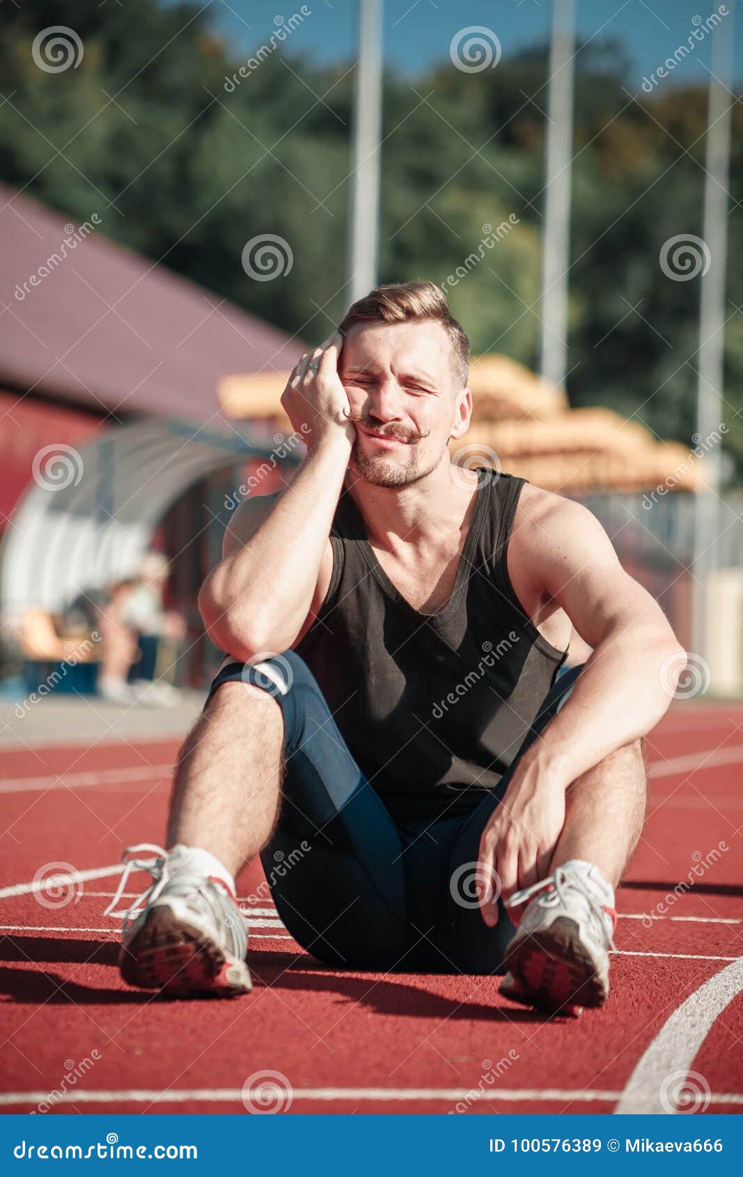Athlete Asleep Sitting in the Stadium Stock Image - Image of emotional ...