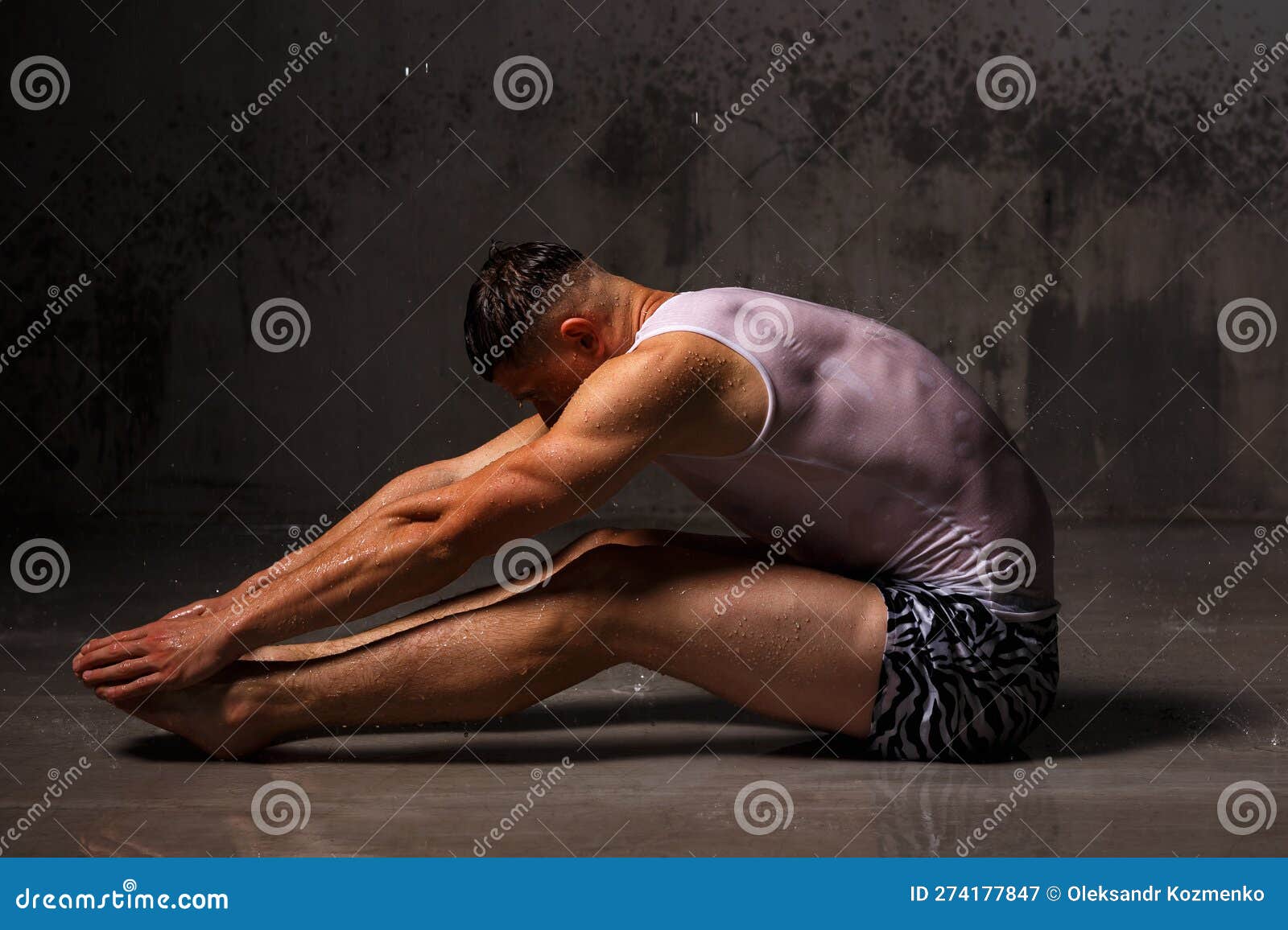 Athlete Bodybuilder Trains in the Studio in the Rain. Stock Image