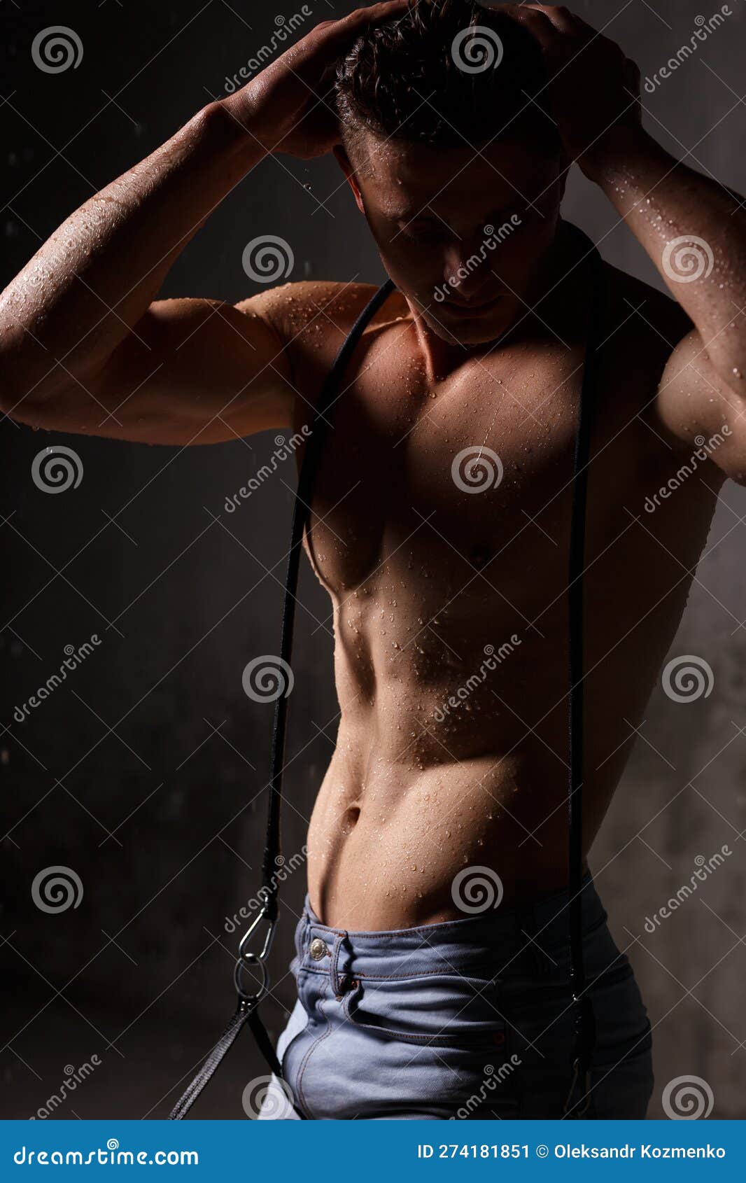 Athlete Bodybuilder Trains in the Studio in the Rain. Stock Image