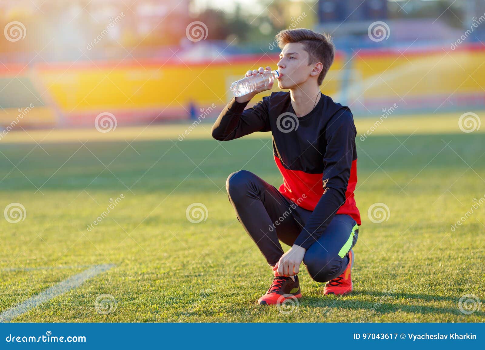 Athlete Drinks Water at the Stadium Stock Image Image of runner
