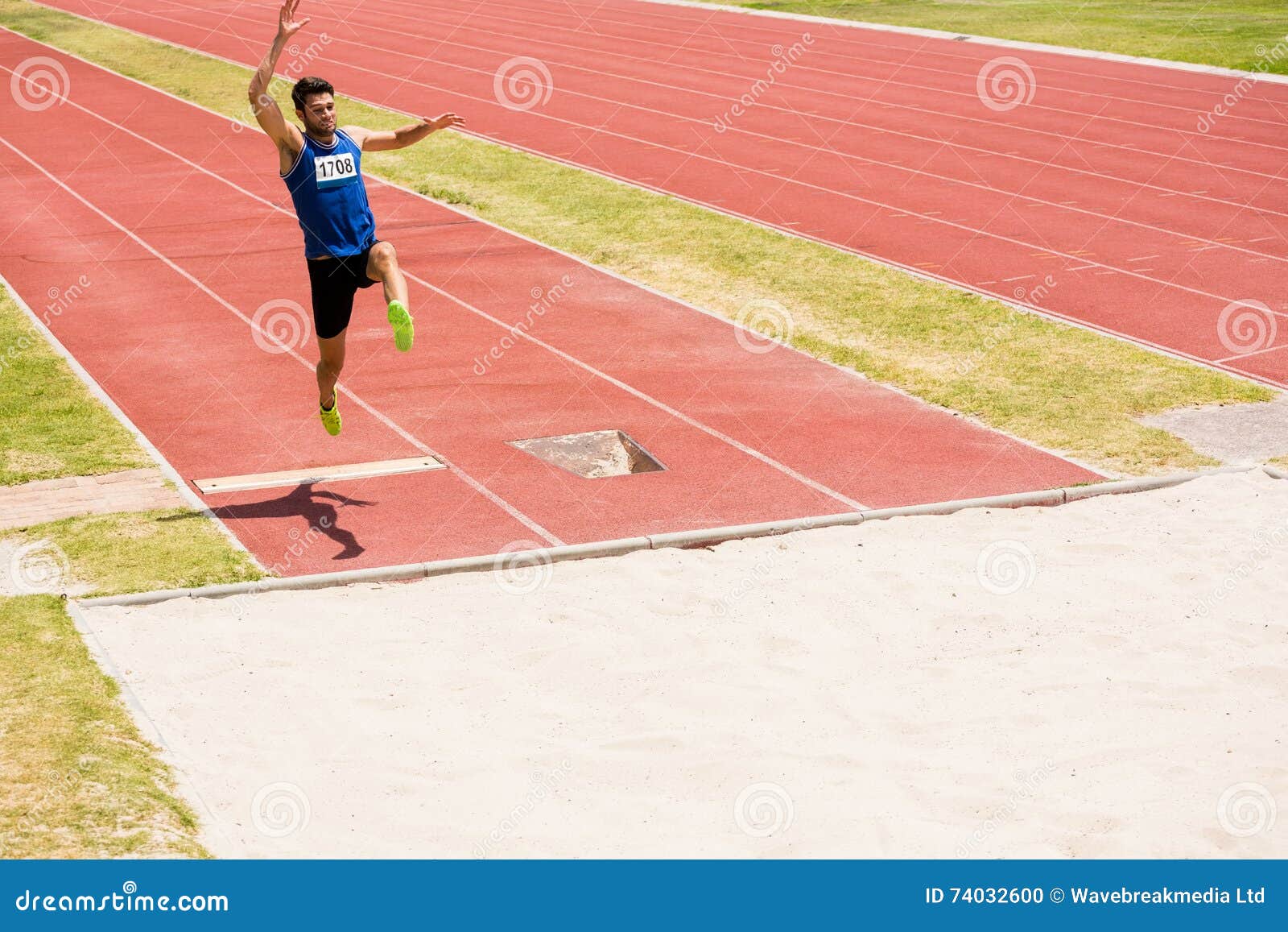 Athlete Performing a Long Jump Stock Photo Image of adult, track