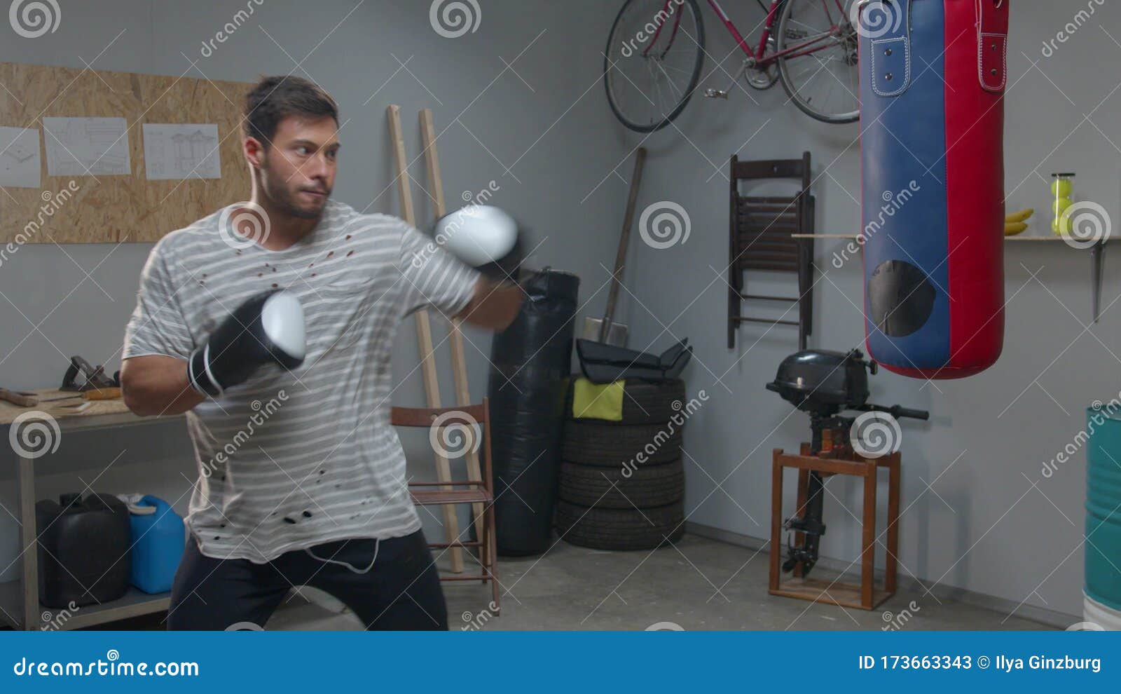 Athlete is Practicing Punches on a Punching Bag Stock Image Image of concentration, hand