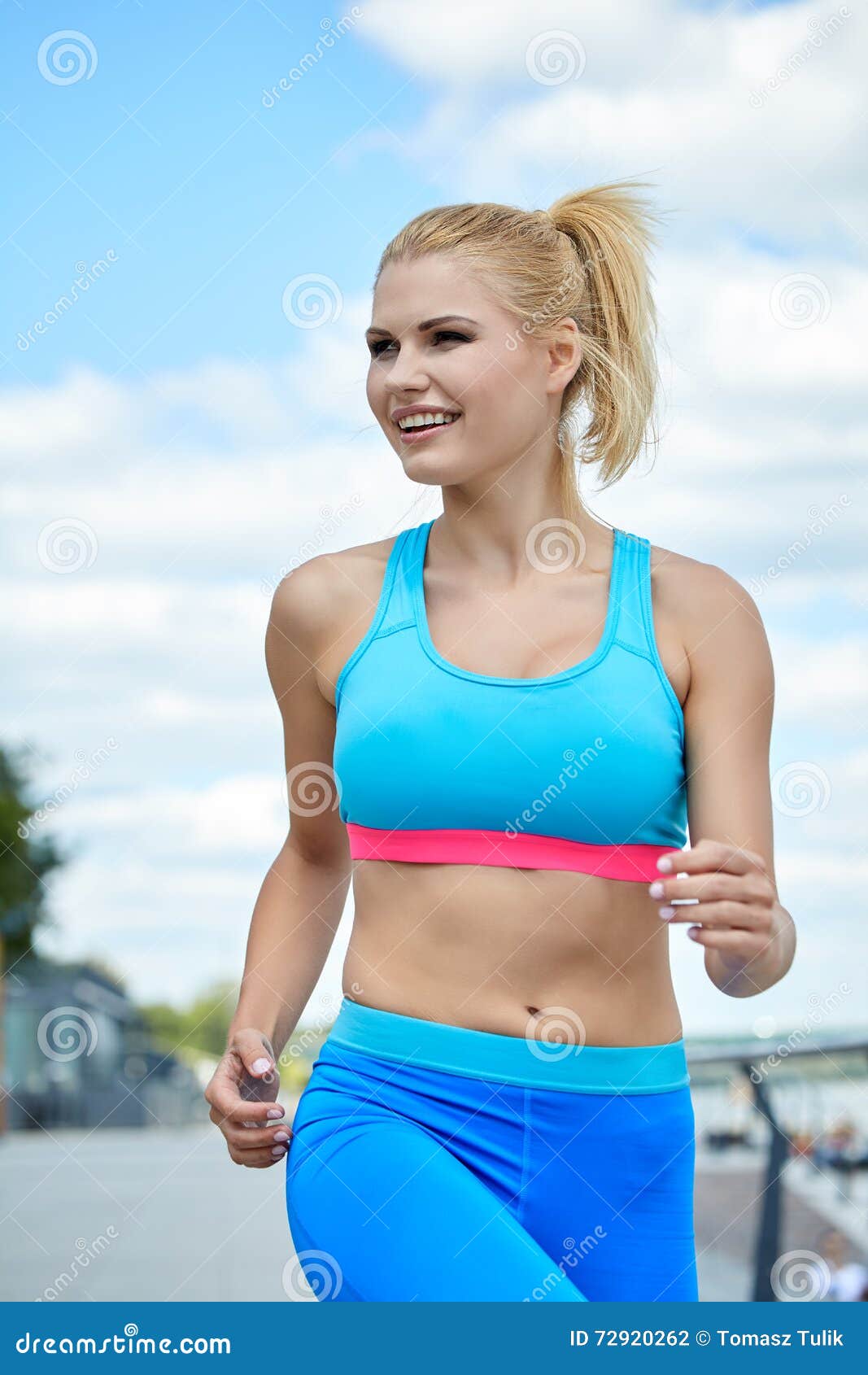 Female Athlete Women's Sportswear Fit Thin Physique Athletic Build Outdoor  City River Stock Photo, Picture and Royalty Free Image. Image 58390789.