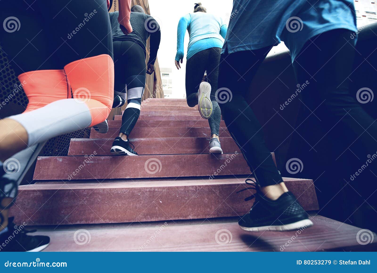 Athletes running upstairs stock image. Image of people - 80253279