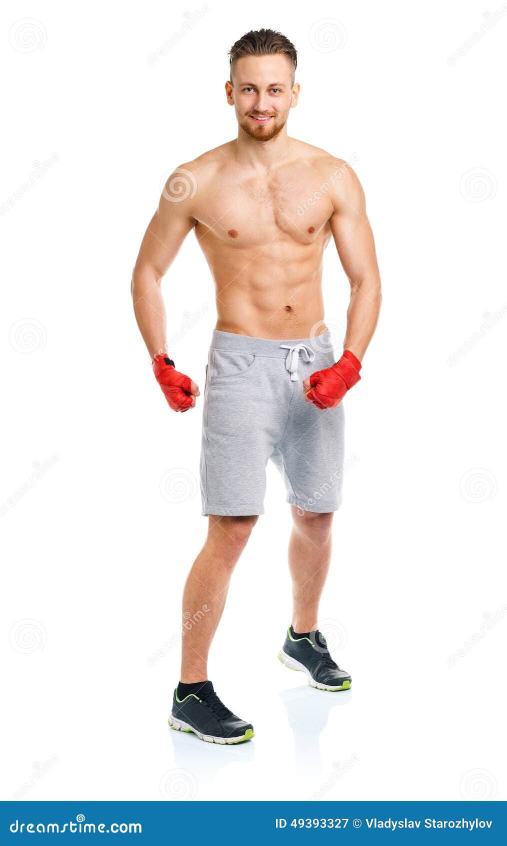 Athletic Attractive Man Wearing Boxing Bandages on the White Stock