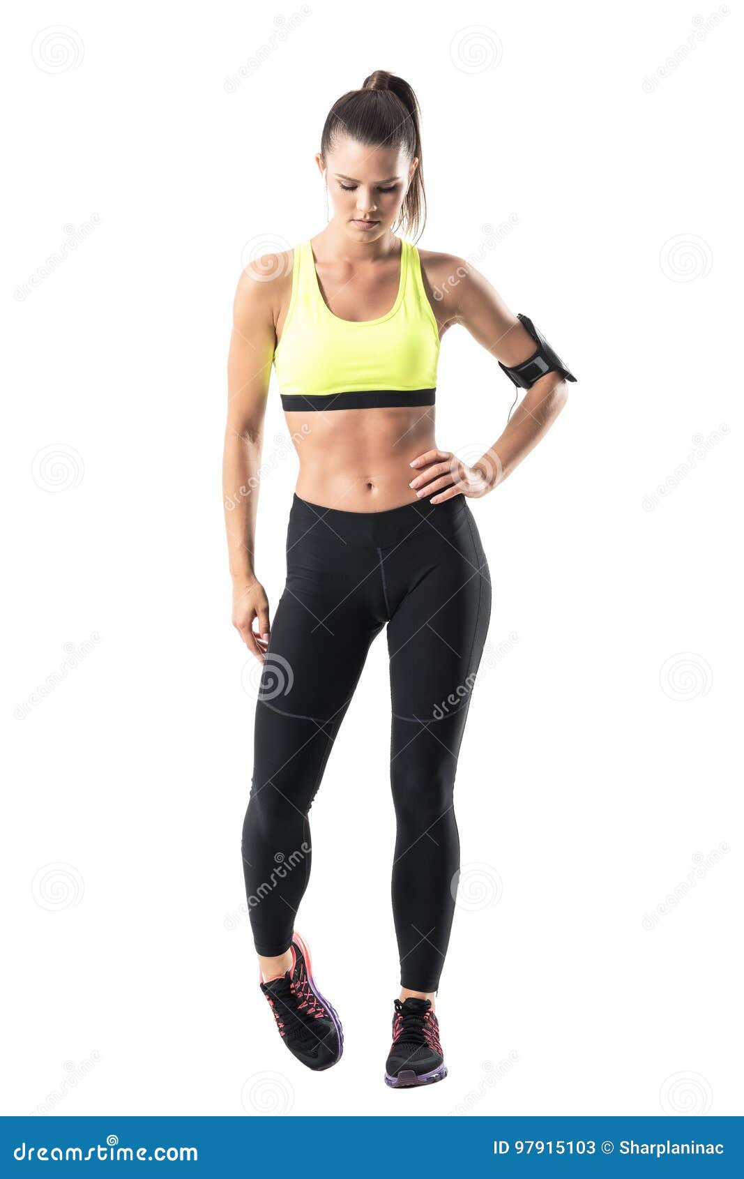 Athletic Fit Female Jogger Warming Up with Foot Ankle Rotation Exercise ...