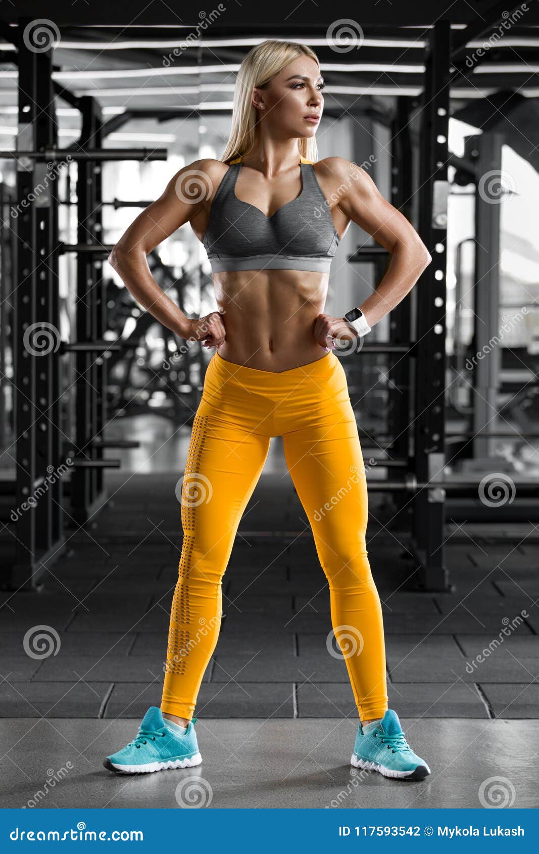 Athletic Girl in Gym, Working Out. Fitness Woman Showing Abs and Flat  Belly, Shaped Body Stock Photo - Image of healthy, muscular: 117593542