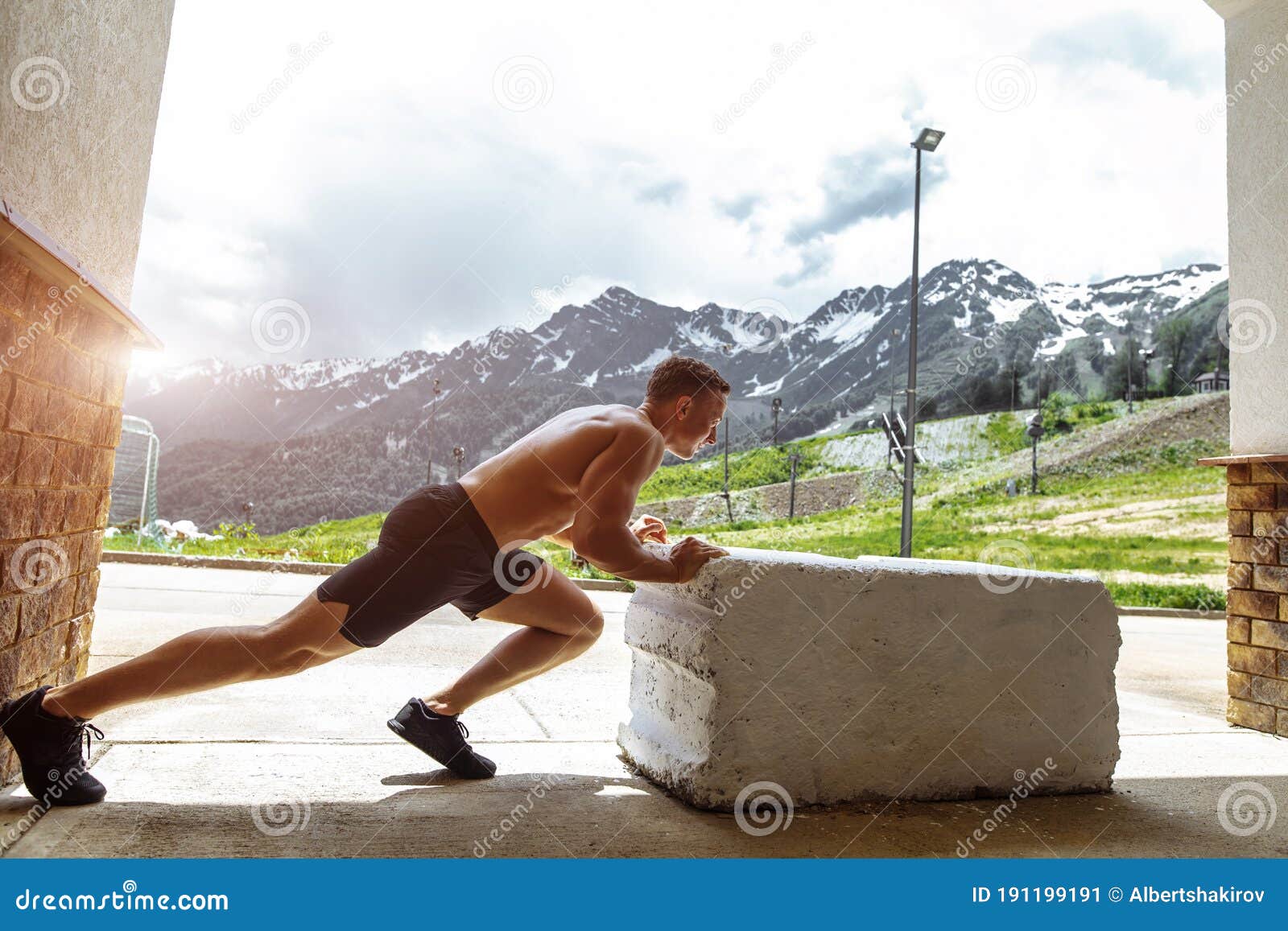 Athletic Man Preparing To Jumping Crossfit Exercise Outdoor in Mountains Stock Image of male: 191199191