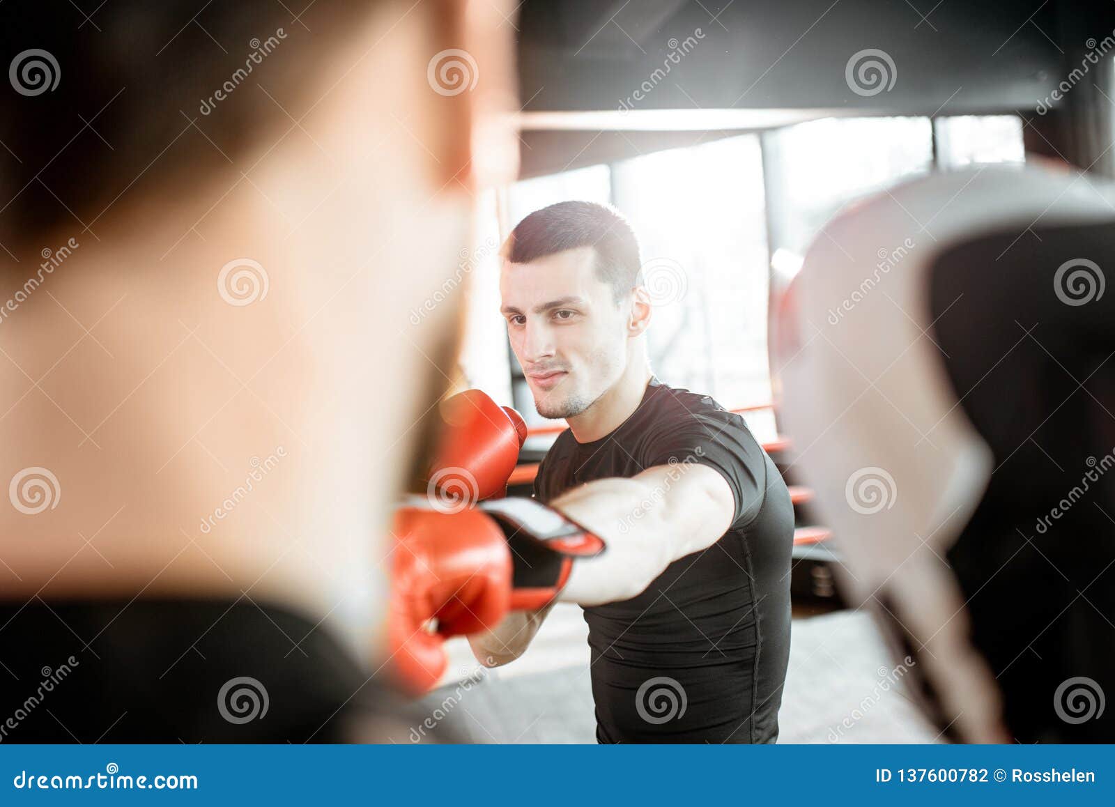 Man Training with Boxing Coach on the Boxing Ring Stock Photo Image