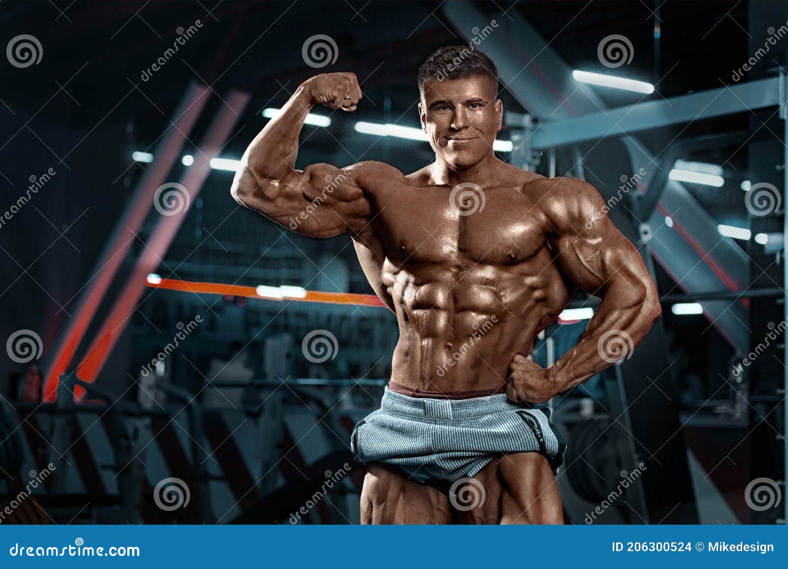 Brutal Strong Bodybuilder Athletic Man Posing Stock Photo