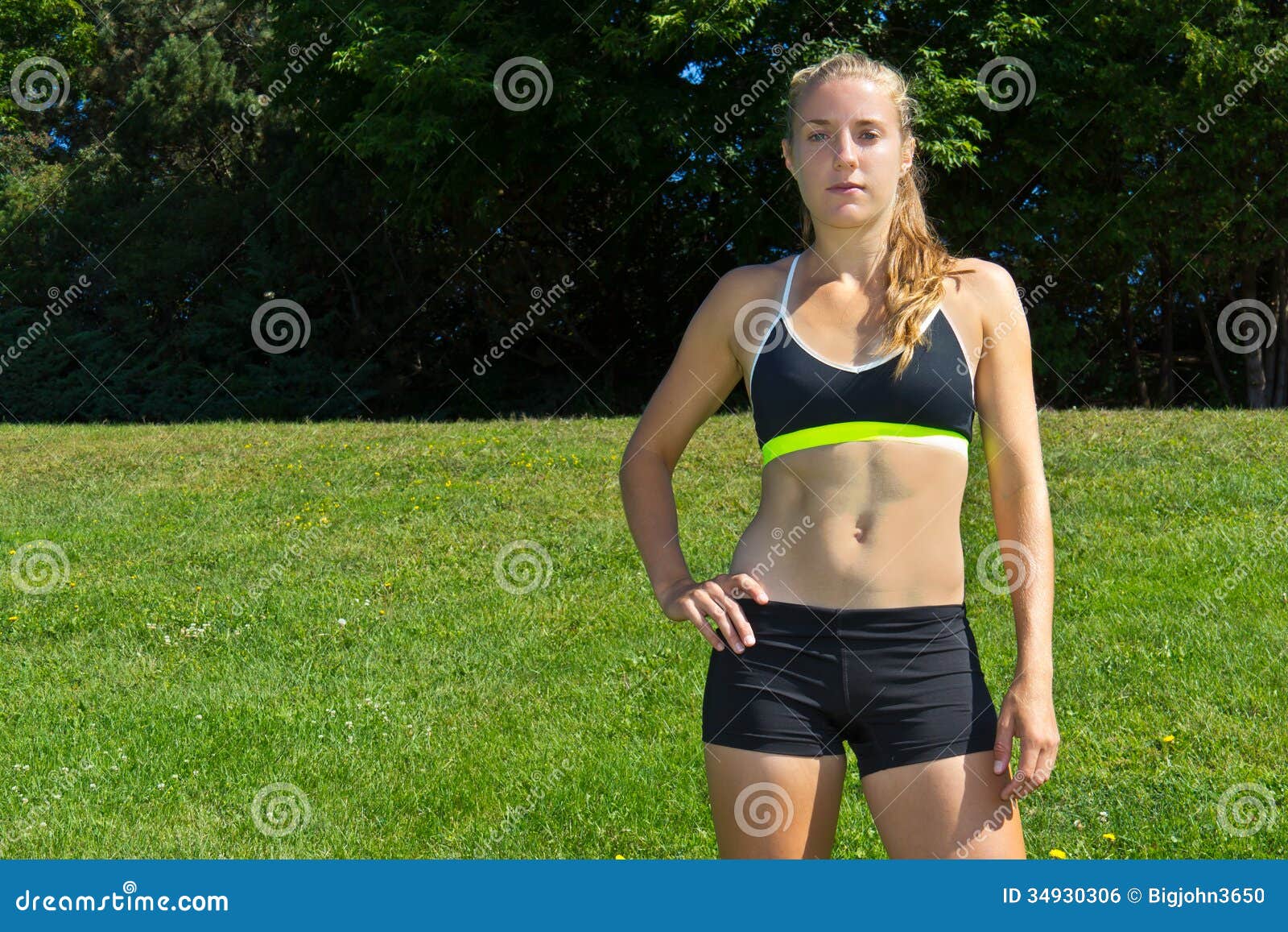 Caucasian woman in sports-bra outdoors Stock Photo - Alamy