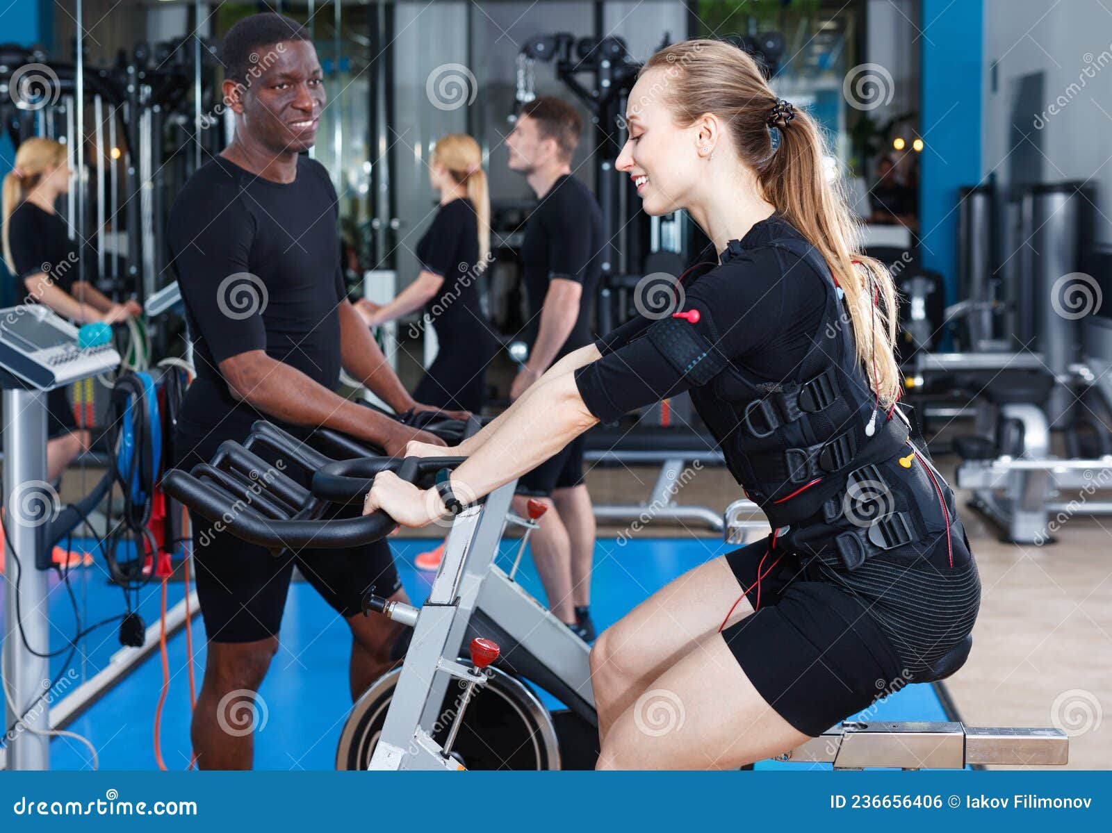 https://thumbs.dreamstime.com/z/athletic-young-girl-electric-muscle-stimulation-workout-fitness-gym-athletic-young-smiling-positive-girl-electric-236656406.jpg