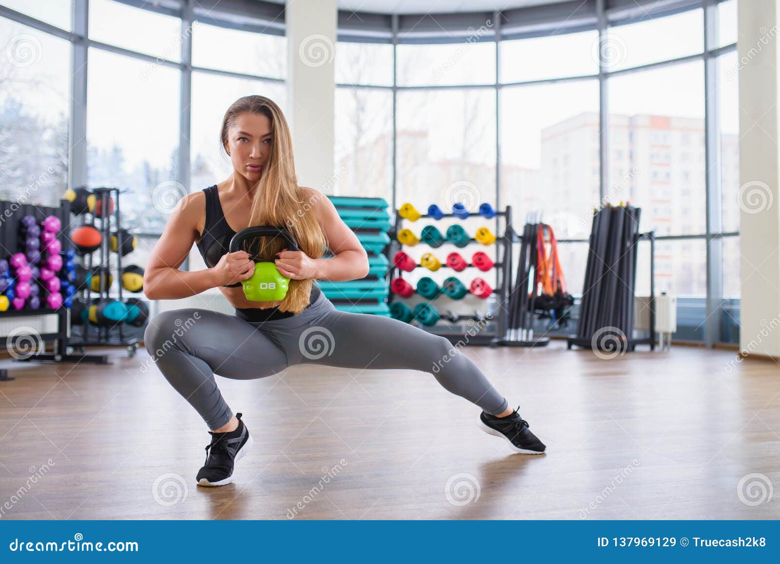 Athletic Young Woman during Workout with Kettlebell at Gym. Beautiful Girl  with Perfect Body and Shape Posing Stock Image - Image of adult, physical:  137969129