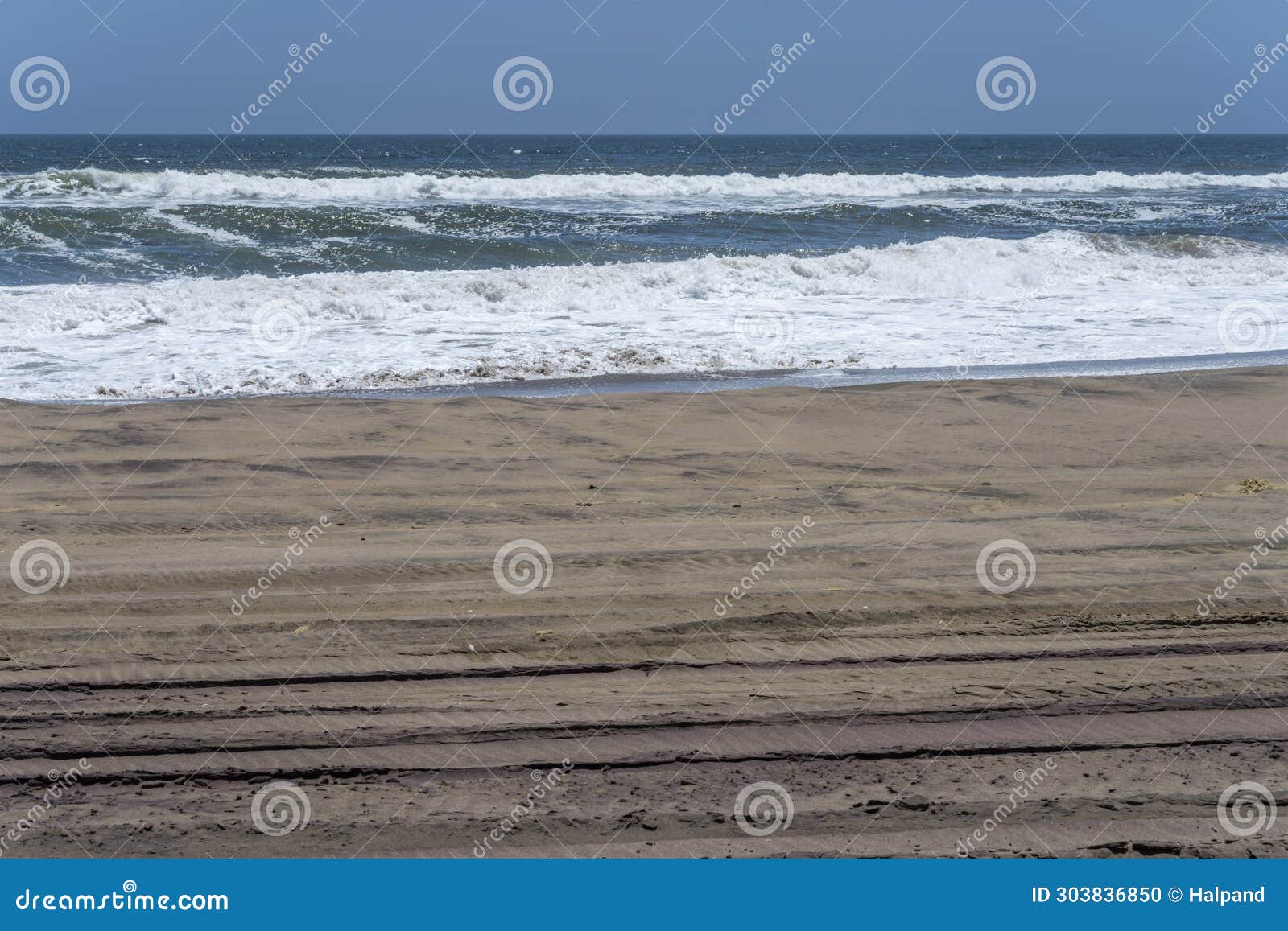 atlanitc ocean waves on foreshore of naukluft desert, walvis bay, namibia