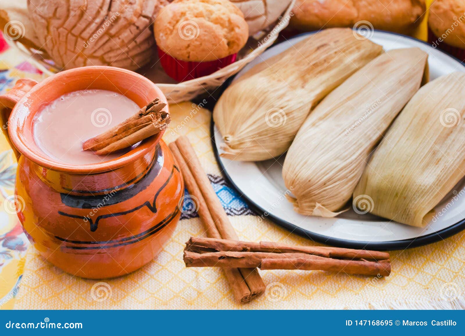 atole de chocolate, mexican traditional beverage and tamales, made with cinnamon and chocolate in mexico