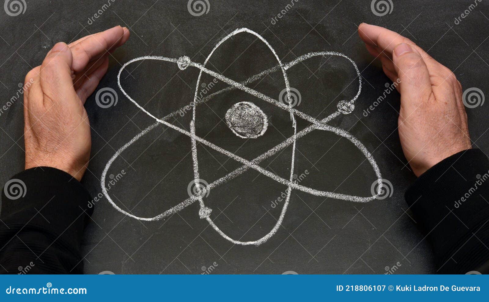 atom  drawn on a blackboard