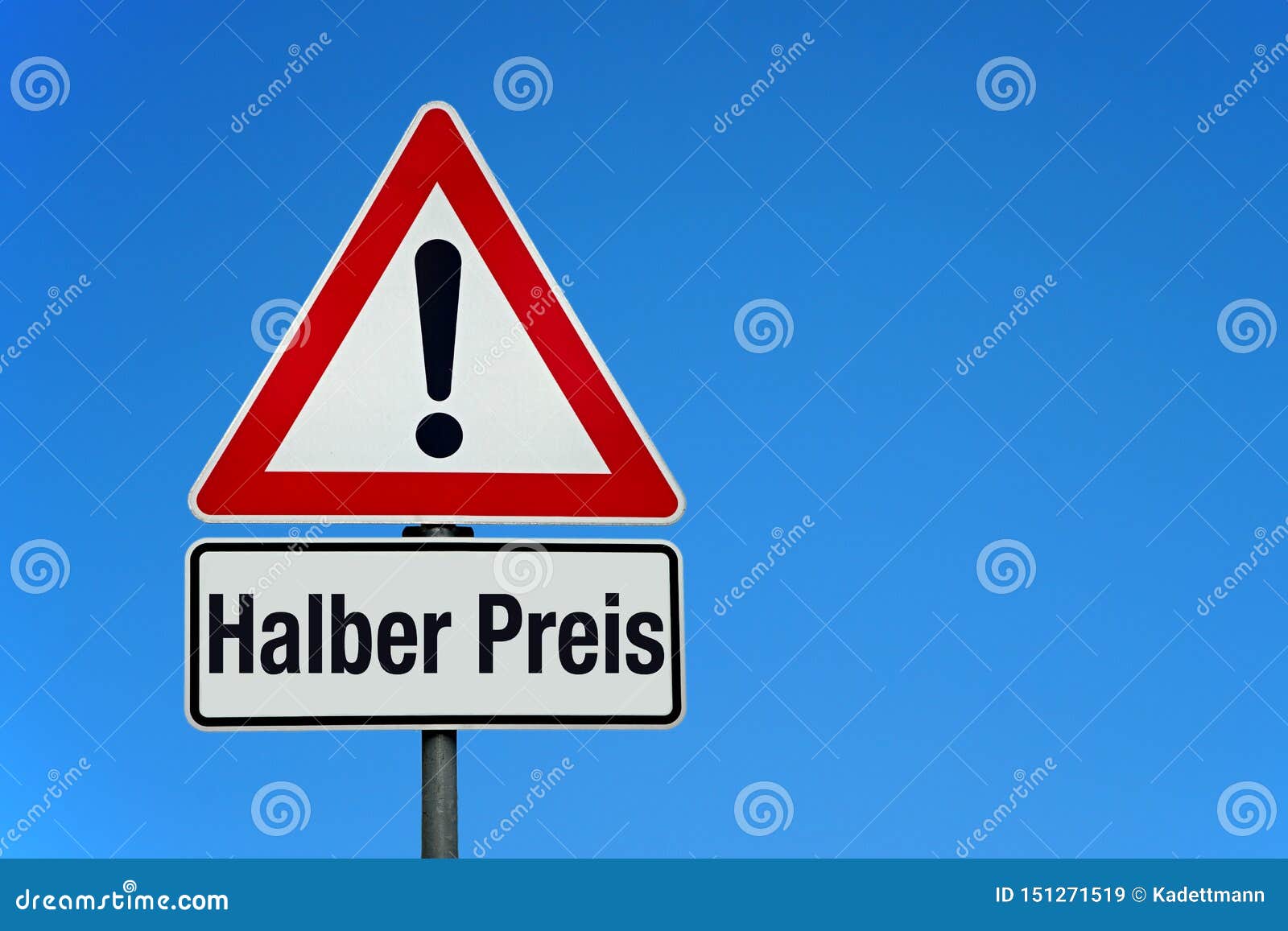 attention and warning sign with blue sky and german text halber preis - translation: half price