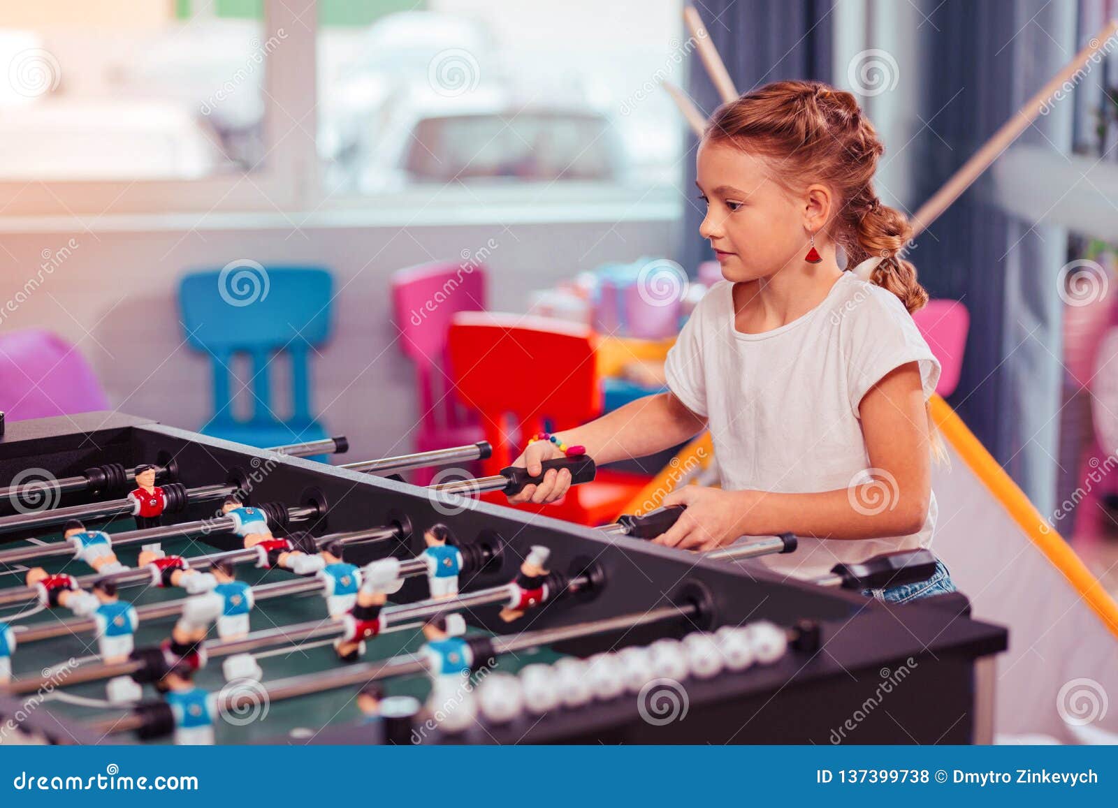 Attentive Little Female Playing Kicker Football Alone Stock Photo ...