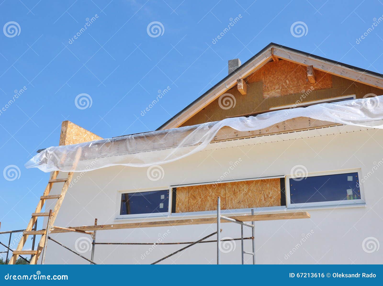 attic insulation. house facade construction exterior