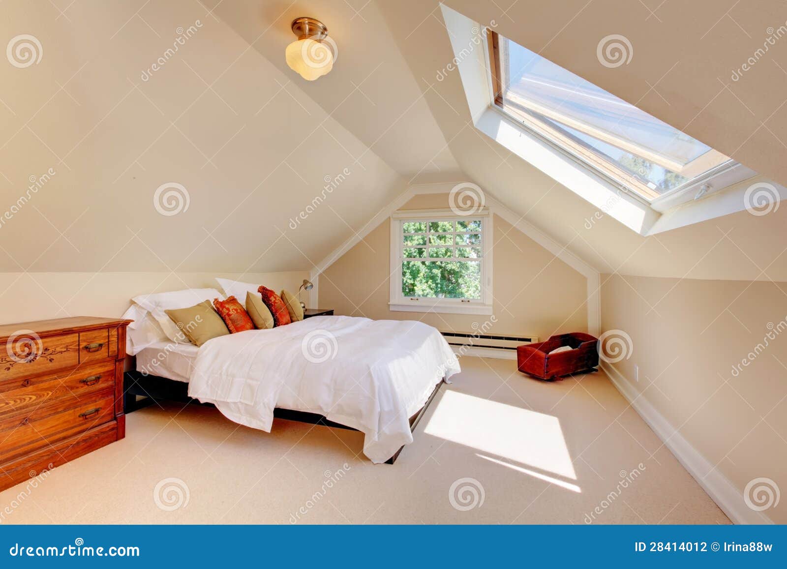 attic modern bedroom with white bed and skylight.