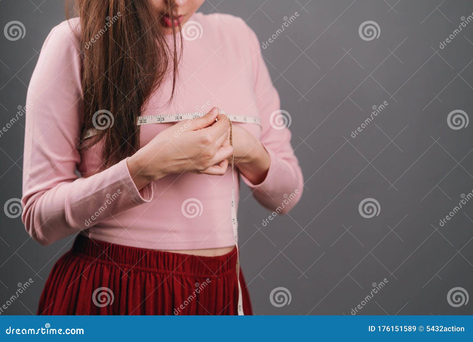 Woman measuring her chest stock image. Image of dressmaker - 176151589