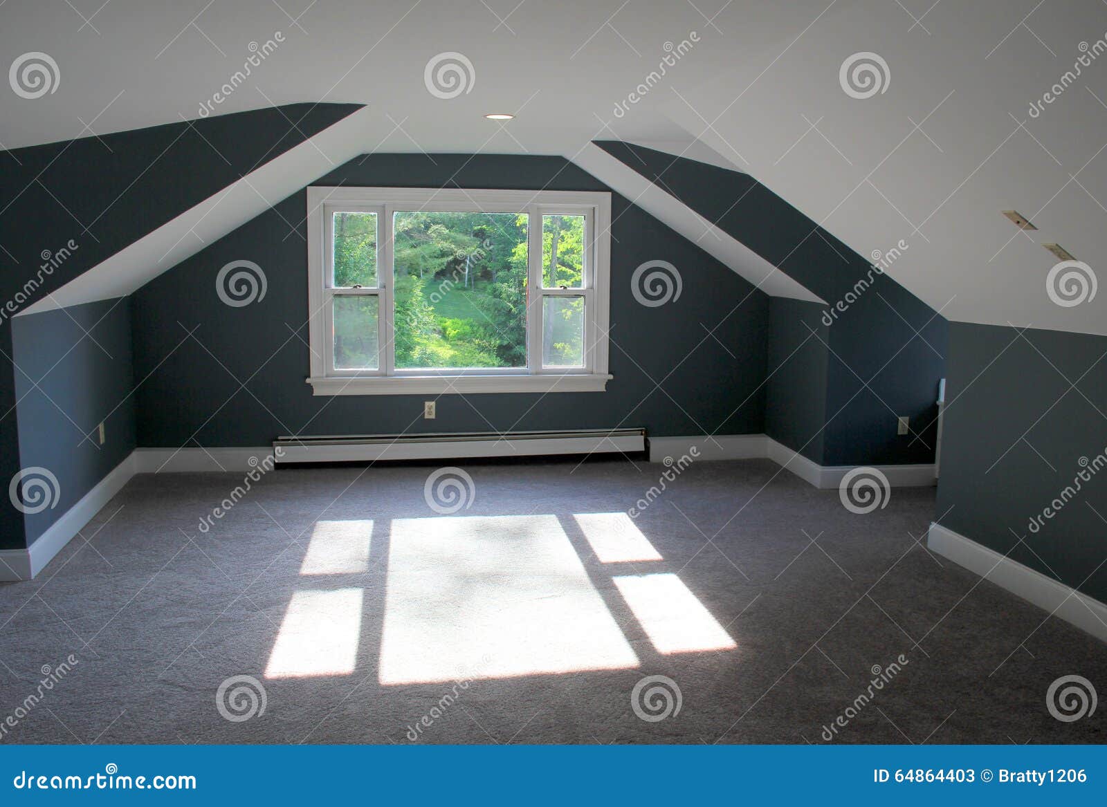 Attractive Attic Bedroom With Angled Ceilings And Warm Tones Of