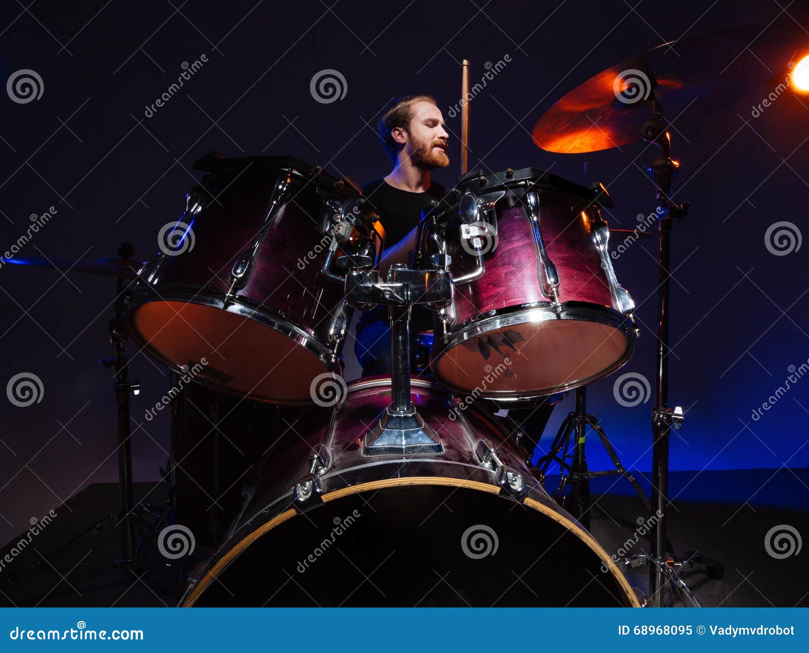 Attractive Bearded Man Drummer Sitting and Playing on His Kit Stock ...