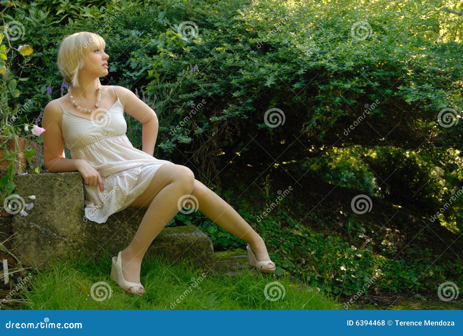 Attractive Blond Girl in Garden Stock Photo - Image of healthy, casual ...