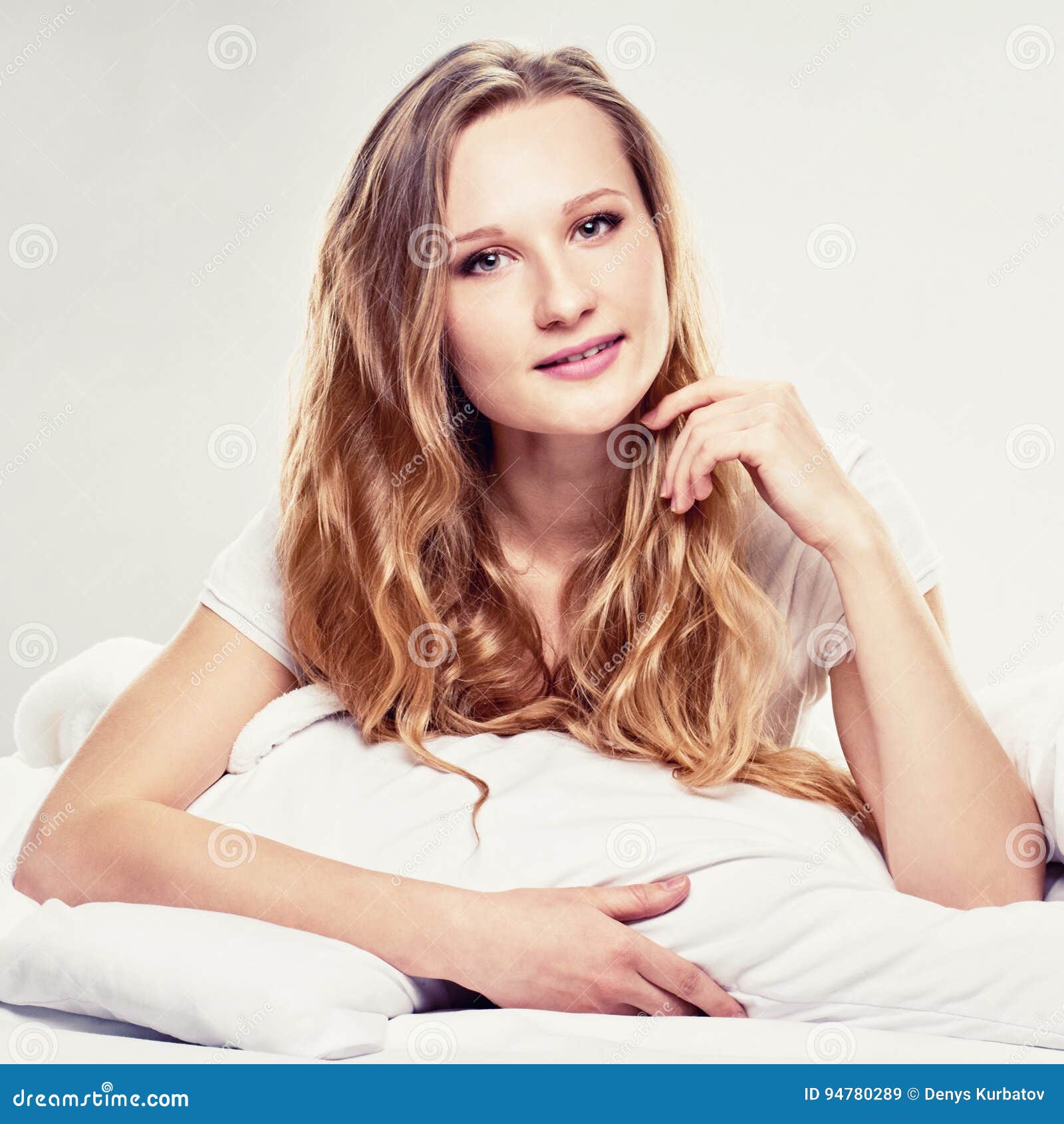 Attractive blonde in bed stock image. Image of model - 94780289