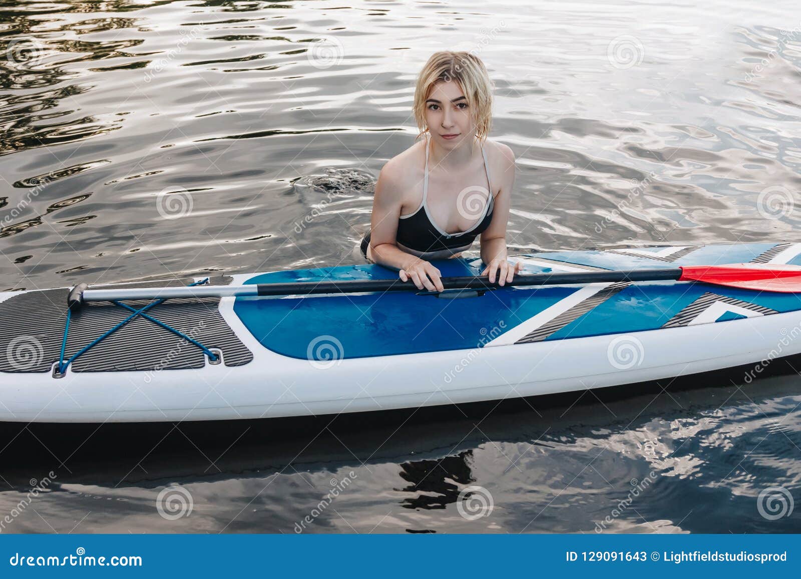 Attractive Blonde Girl with Paddle Board Stock Image - Image of ...