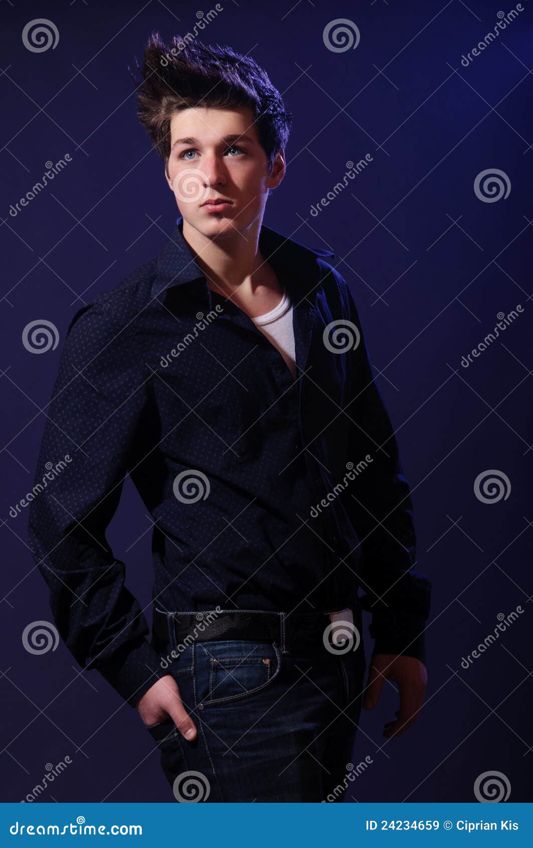 Attractive Boy Wearing A Blue Shirt RoyaltyFree Stock Photography