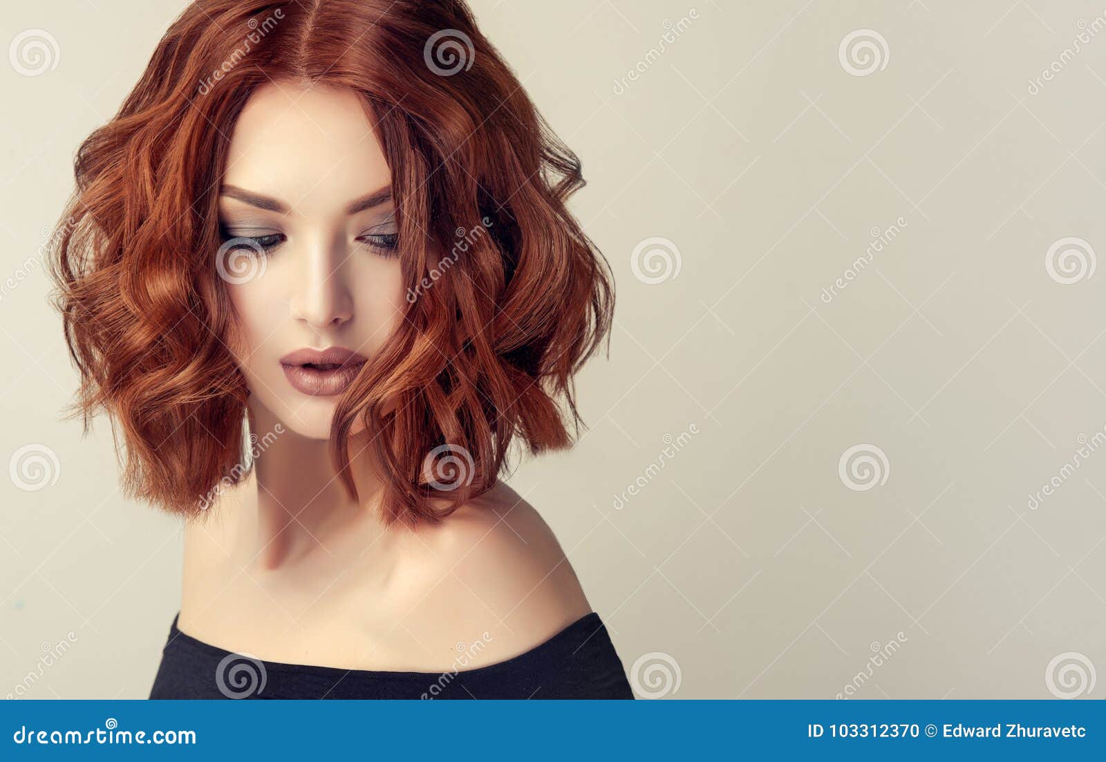 attractive brown haired woman with modern, trendy and elegant hairstyle.