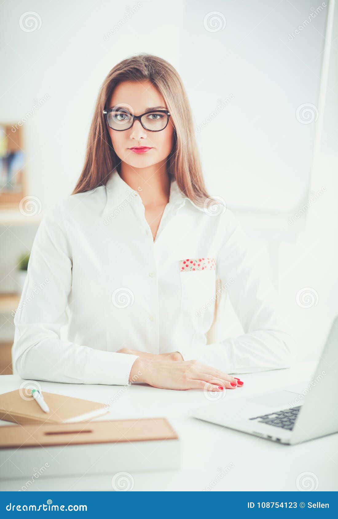 Attractive Businesswoman Sitting in the Office, at the Desk. Attractive ...