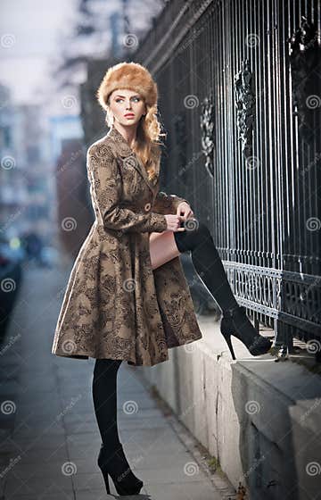 Attractive Elegant Blonde Young Woman Wearing an Outfit with Russian ...