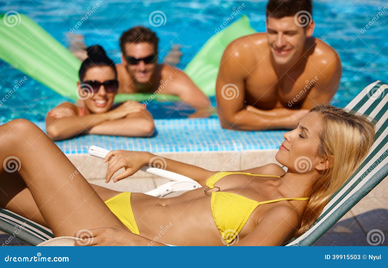 attractive female and companionship by pool