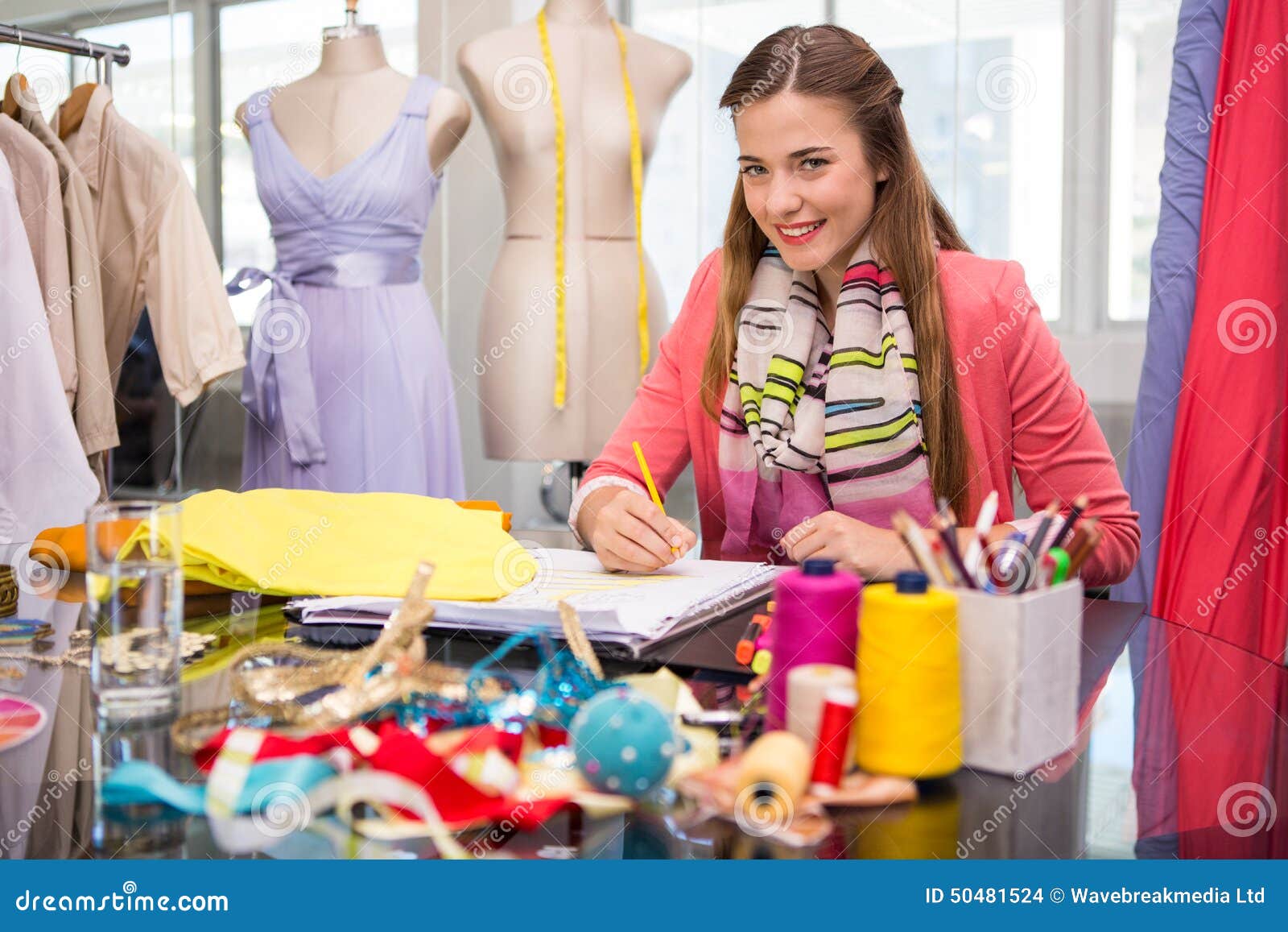 Attractive Female Fashion Designer Sketching Stock Photo - Image of ...