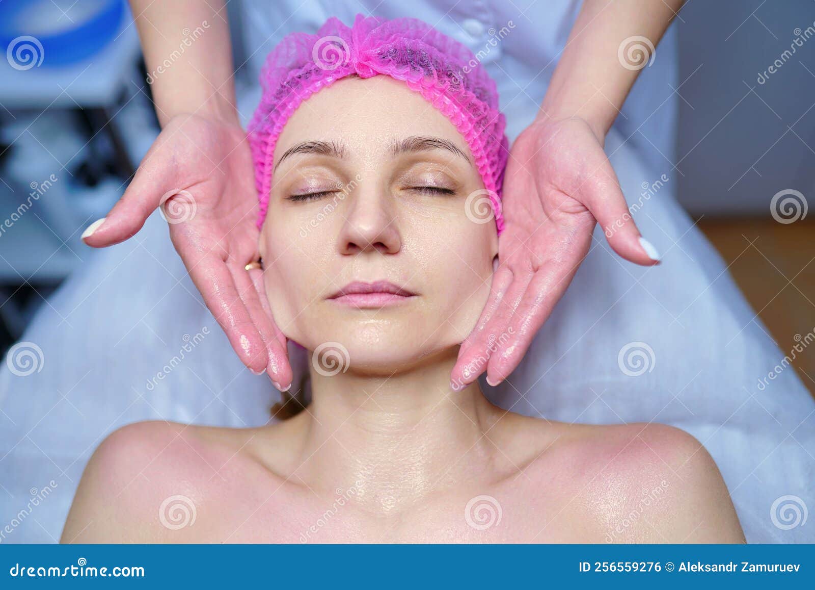 Attractive Female At Spa Health Club Getting A Facial Massage Beautician Doing Massage Of Face