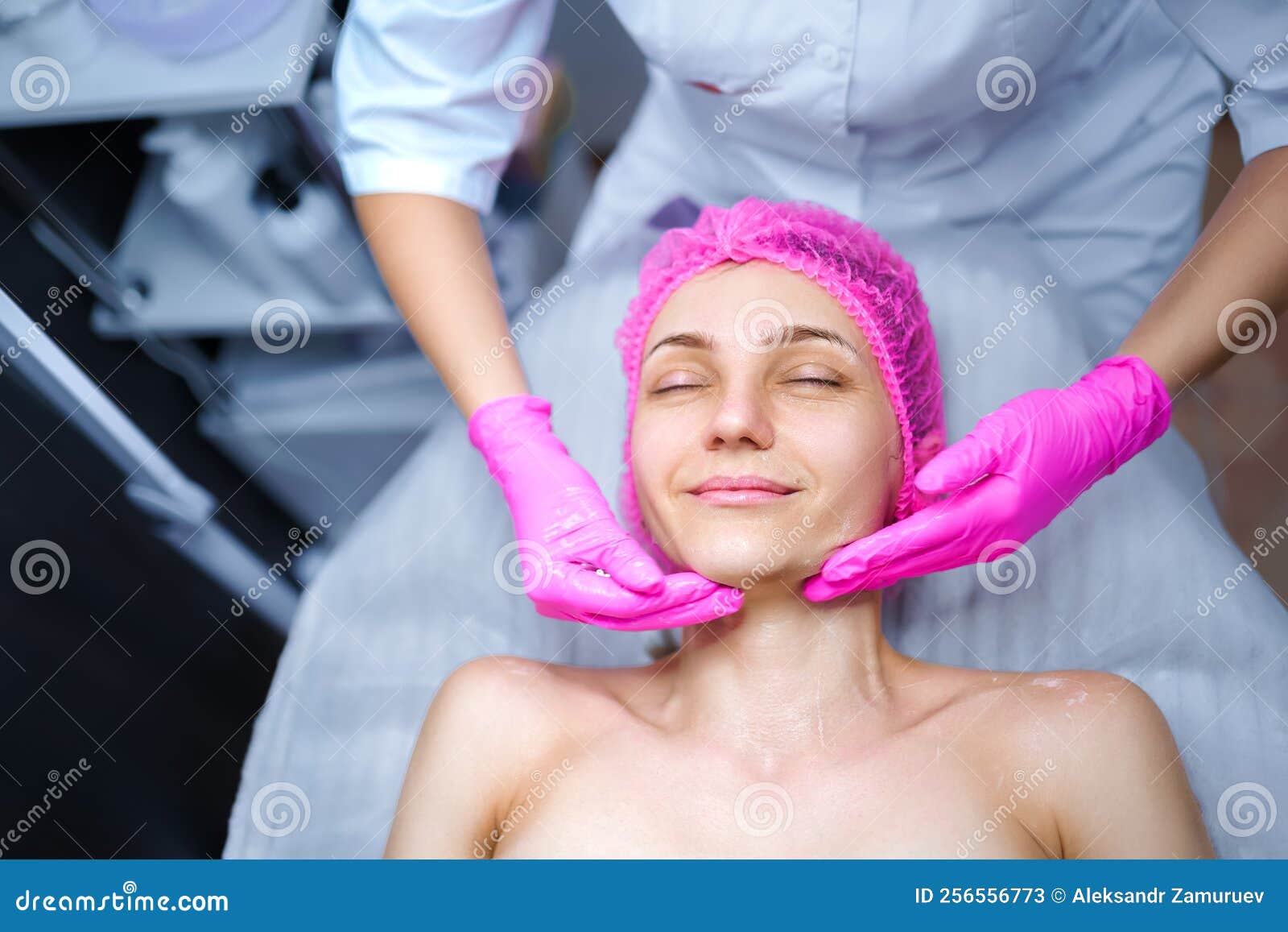 Attractive Female At Spa Health Club Getting A Facial Massage Beautician Doing Massage Of Face