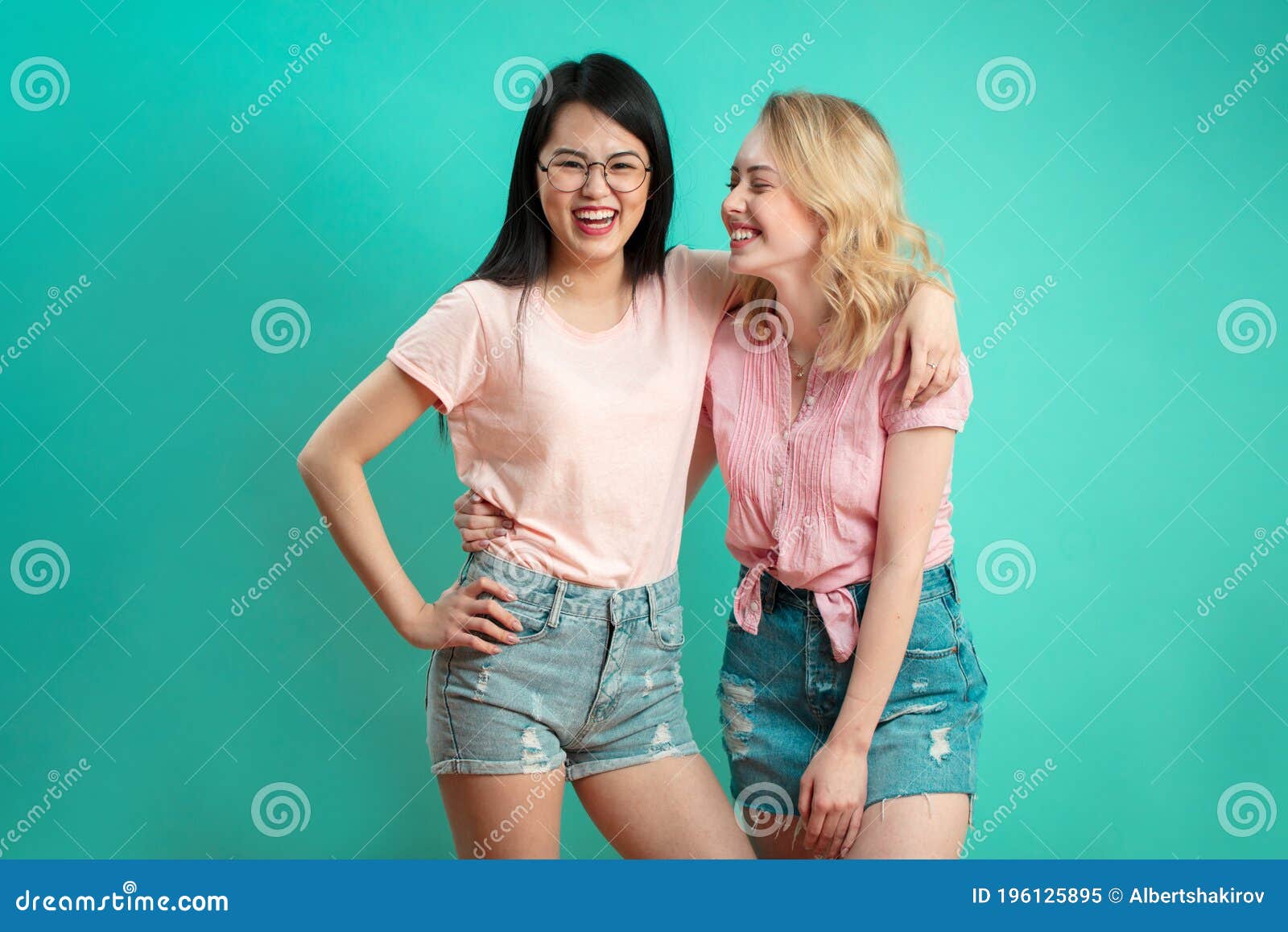 Positive multiracial young fashionable women in summer outfits