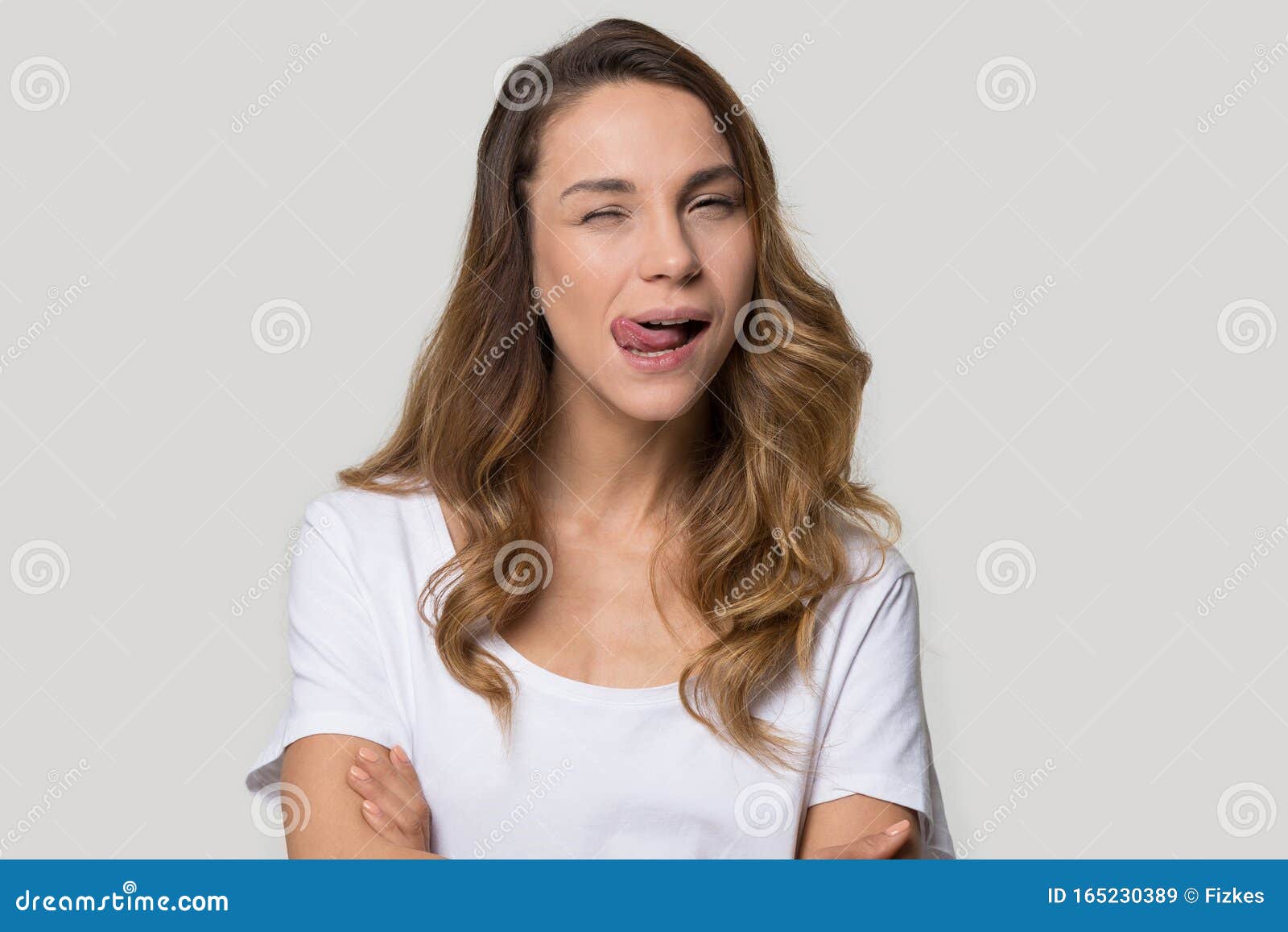 Attractive Funny Young Woman Showing Tongue and Winking Stock Image - Image of emotional, flirt: 165230389 Attractive Funny Young Woman Showing Tongue and Winking Stock Image - Image of emotional, flirt: 165230389