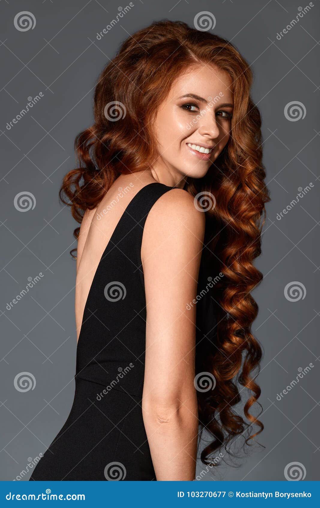 Attractive Ginger Woman With Wave Hairstyle Curly In Studio